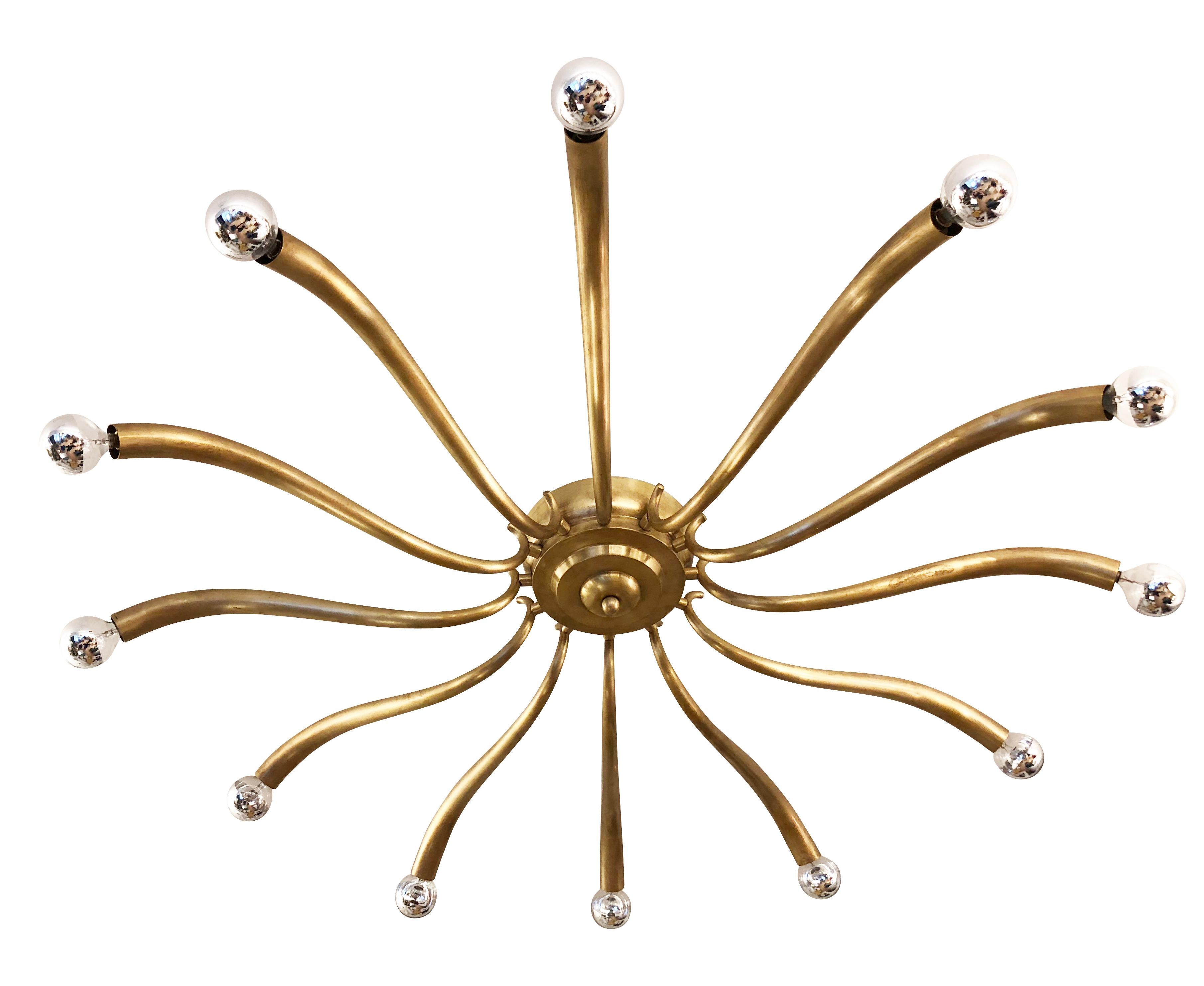 Large 1940s chandelier attributed to Guglielmo Ulrich with twelve sloping brass arms. Holds twelve candelabra sockets.

Condition: Excellent vintage condition, minor wear consistent with age and use

Measures: Diameter 40”

Height 5”.

 