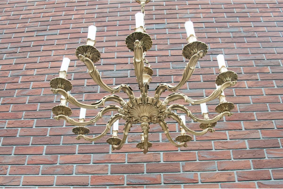 Brass chandelier from the 1950s

Dimensions: height 115 cm / dia. 95 cm.