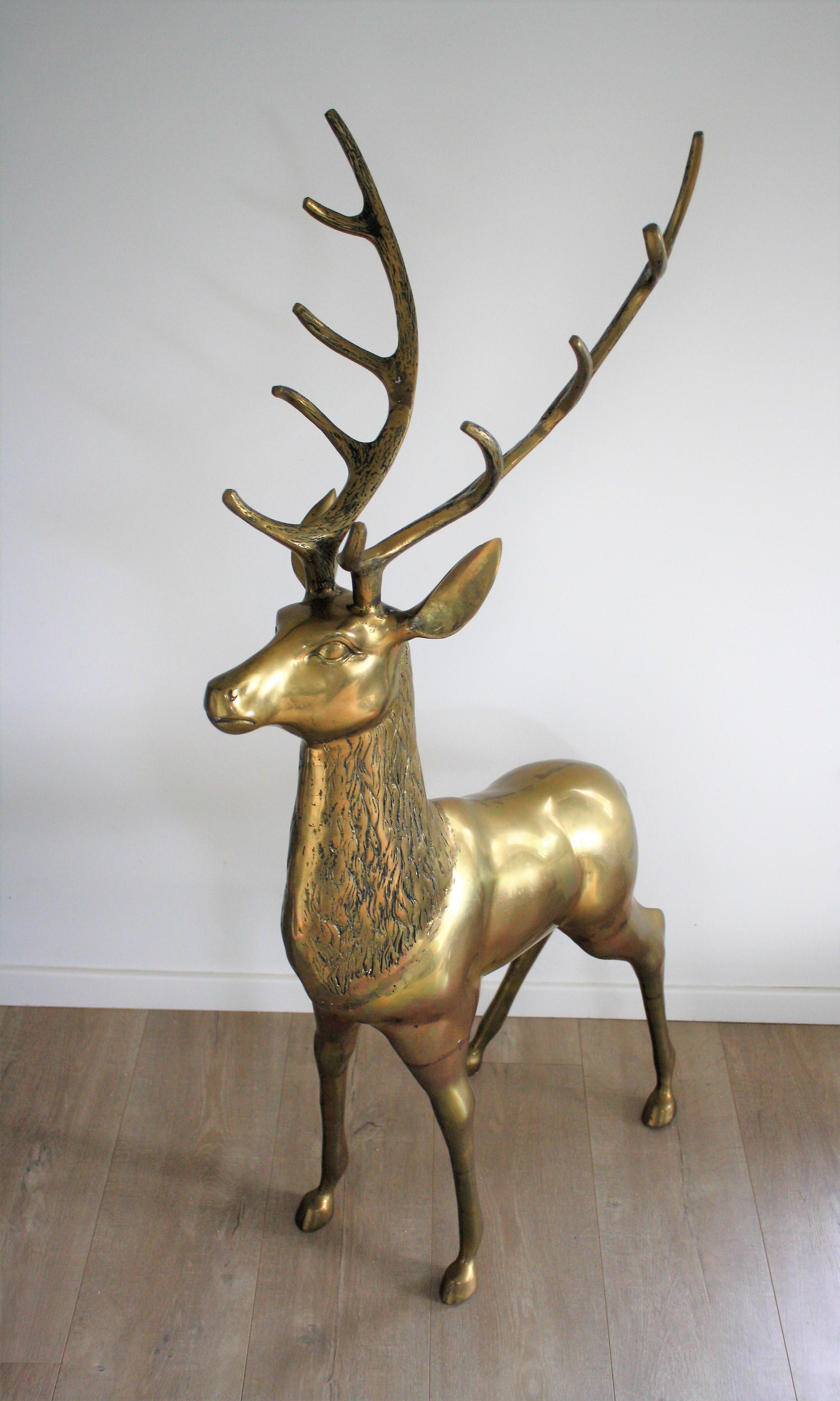 large brass deer statues