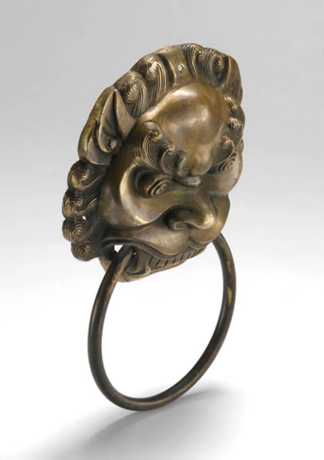 Our brass knockers can be used as door knockers or hand towel rings. Fine craftsmanship depicts the ancient mythical animals with a high level of artistic expression. The featured lions are believed to be guardians. Our knockers have an antiqued