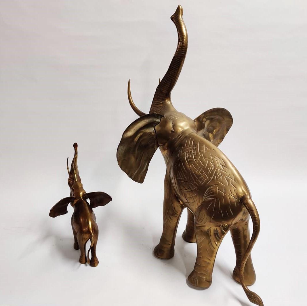 Cute and eye-catching pair of brass mother and son elephant sculptures.

Lovely natural position, great detailing.

Good condition with patina.

1970s, Belgium

Dimensions:

Mother
Height 105 cm/41.33