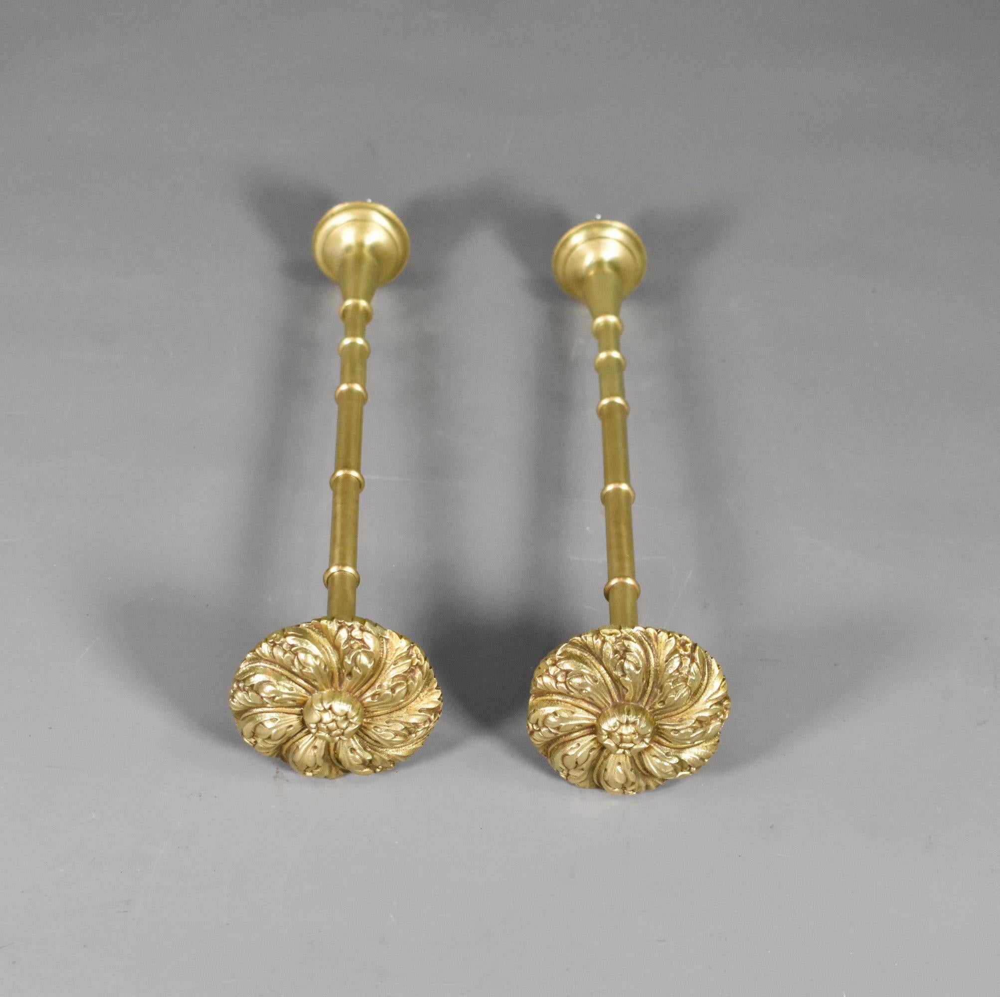 Large Brass French Curtain Tie-Backs Second Empire
 
This handsome matching pair of solid grass curtain tie-backs / drapery finials feature swirling acanthus leaves and flower bud rosette roundels.
 
The long turned stems lead to elegantly shaped