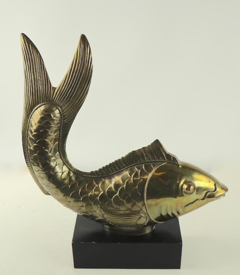 Large brass koi sculpture, circa 1970s. This example is in very good original vintage condition, clean and ready to use. Measures: Base 10 W x 4.5 D x 3 H inches.