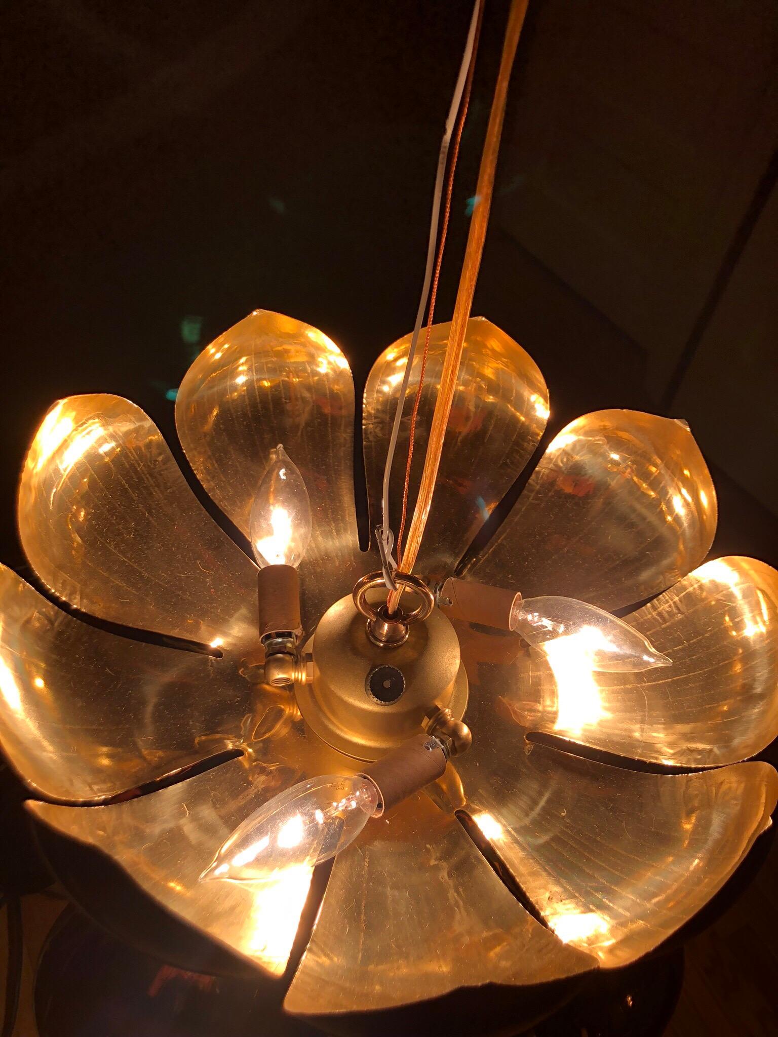 Parzinger style large brass lotus pedant fixture by Feldman Lighting Company. Delicate and beautifully etched brass petals feature both up an down lights. The largest of the Feldman Lotus Fixtures - and often described as in the style of Tommi