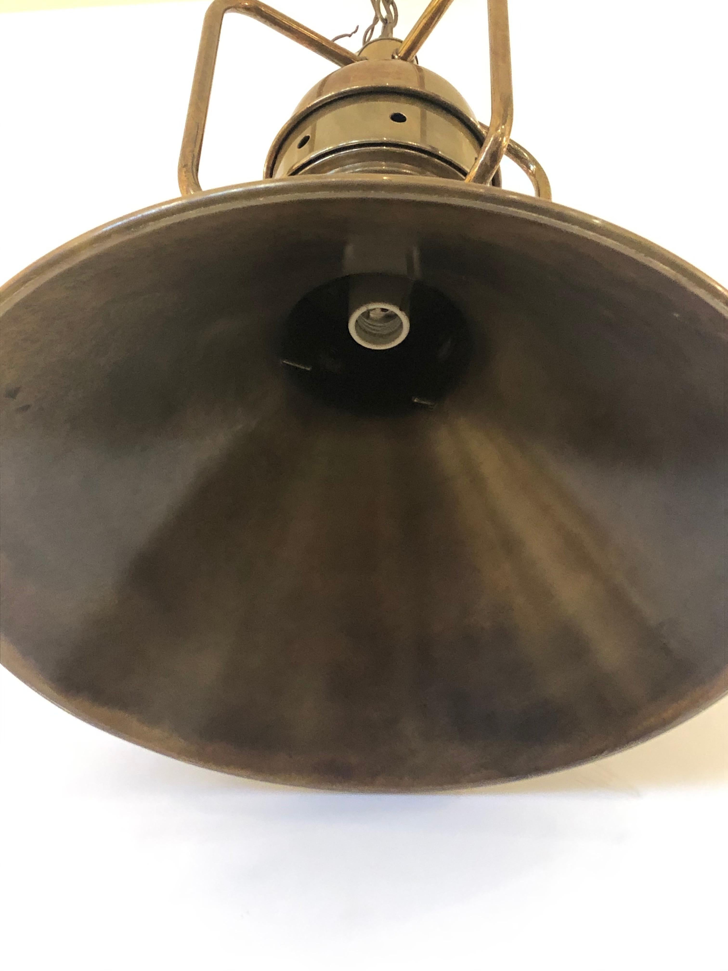 Authentic large brass industrial light fixture having a cool industrial vibe. Original 14