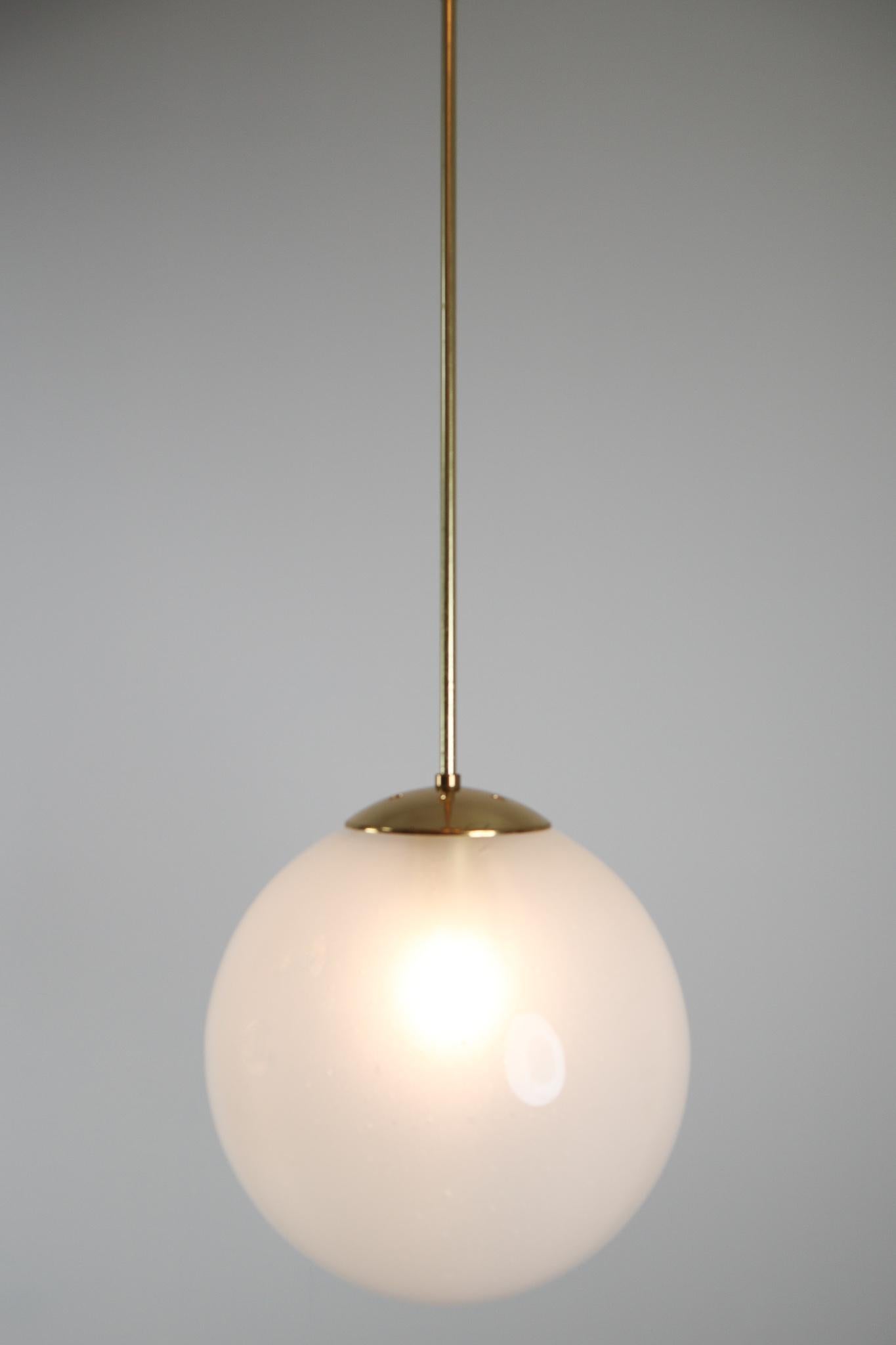 Mid-Century Modern Large Brass Pendant with a Pearl-White Hand Blown Globe by Preciosa, 1970s For Sale