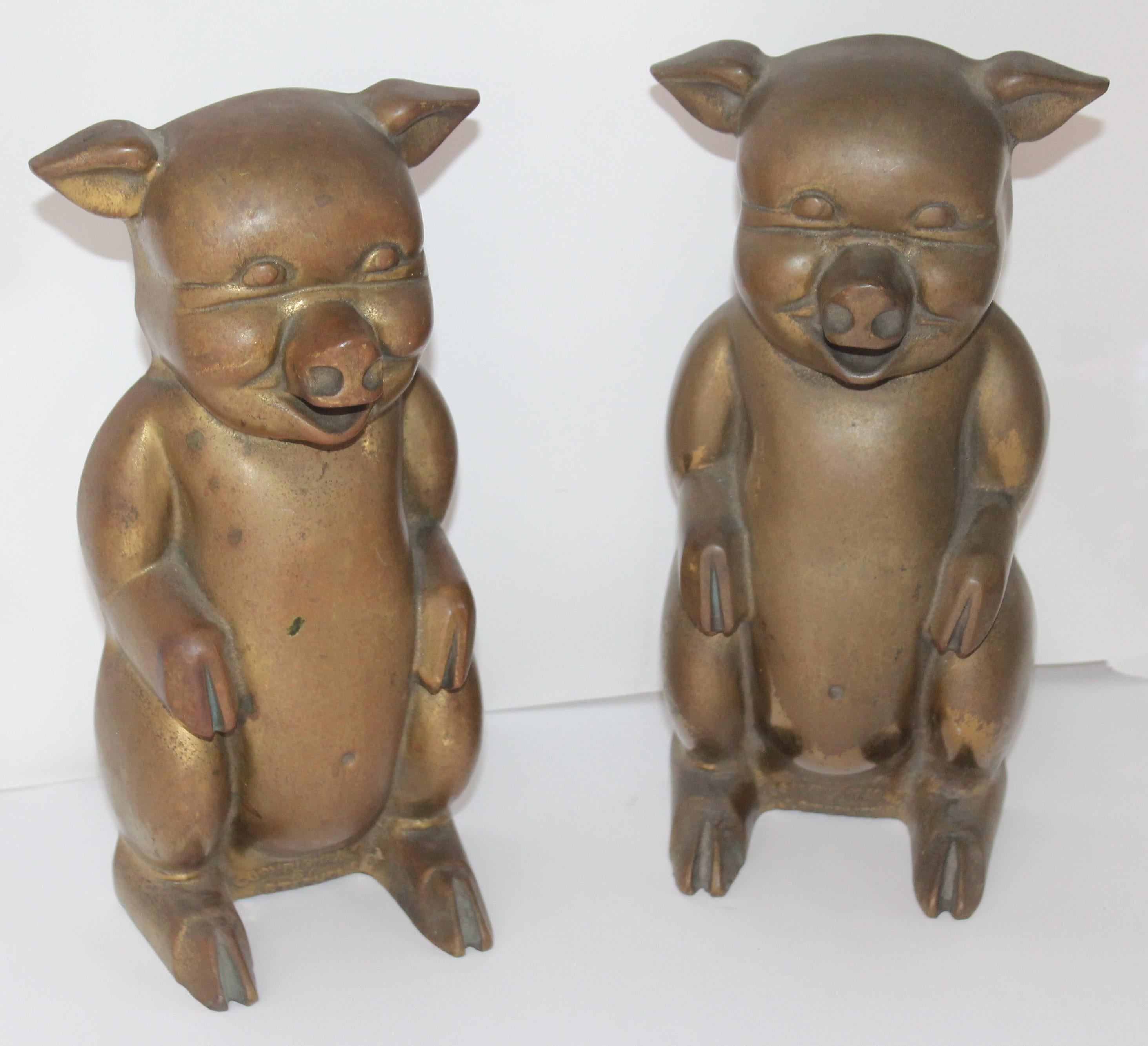 These two big pigs could even be doorstops as they are tall and heavy. They have a nice mellow patina / surface. They are in great condition and are signed and dated. Stephens copyright 1946. So fun and wild. Patinaed.