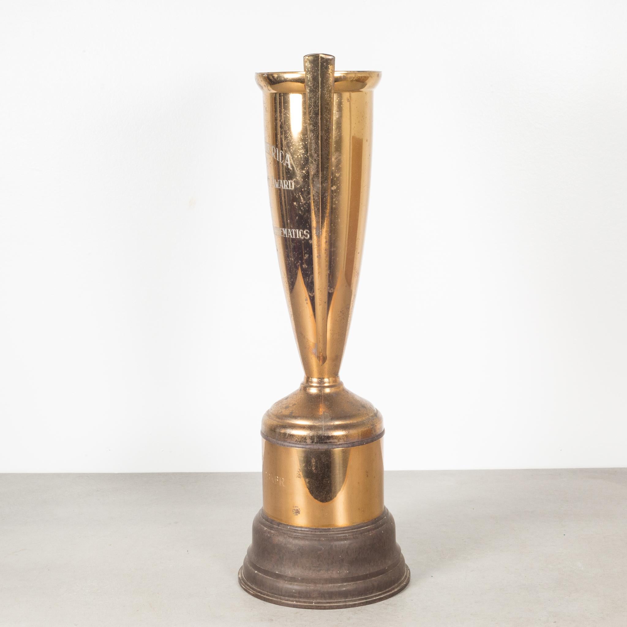 About

An original brass plated cup trophy with a Bakelite base. Engraved 