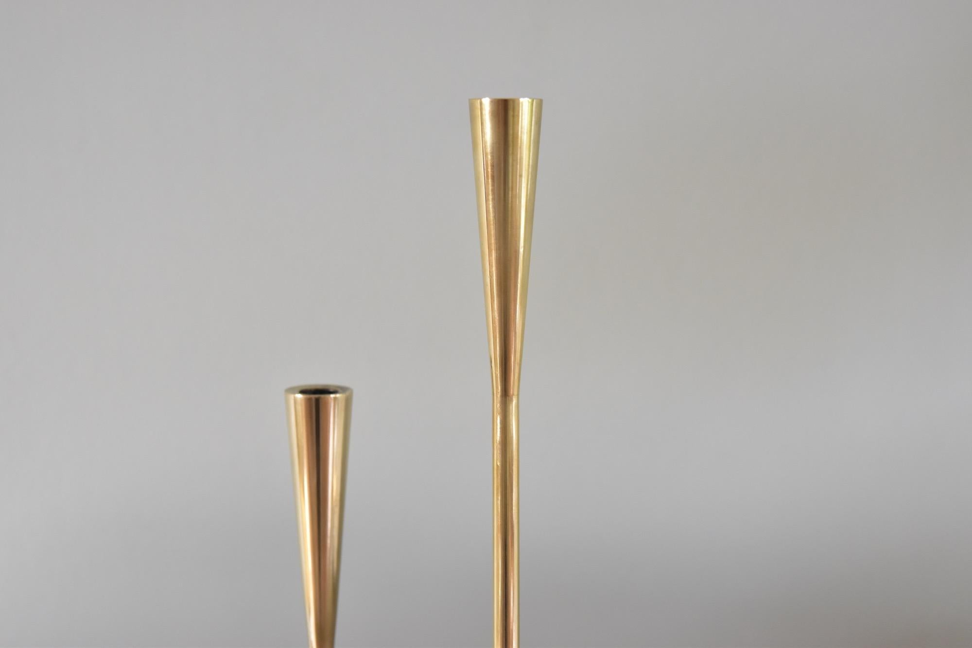 Large serpentine form candlesticks in solid brass by Illums Bolighus Copenhagen Denmark.
Price for one candleholder.
