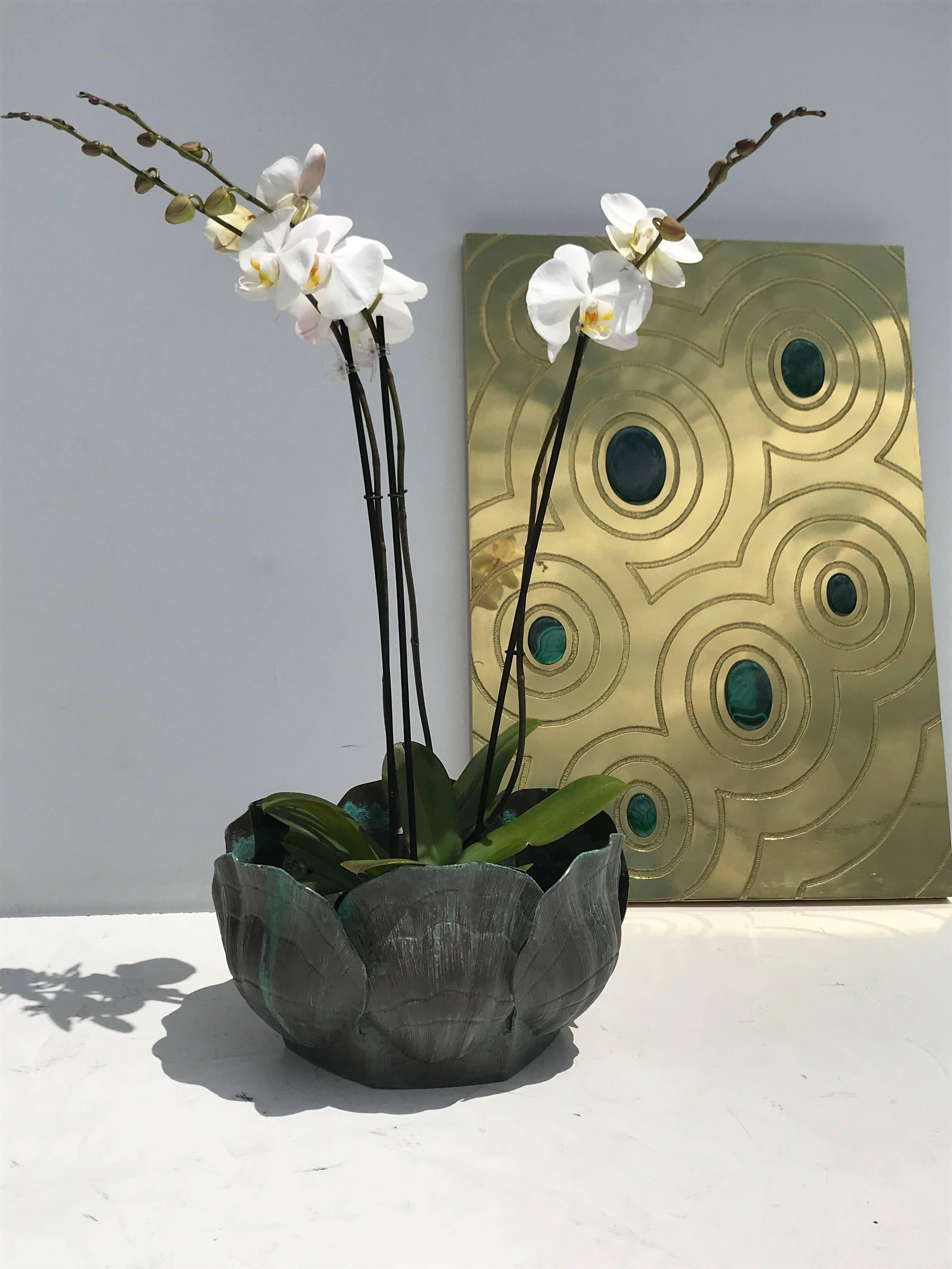 Large brass shell planter in verdigris patina.