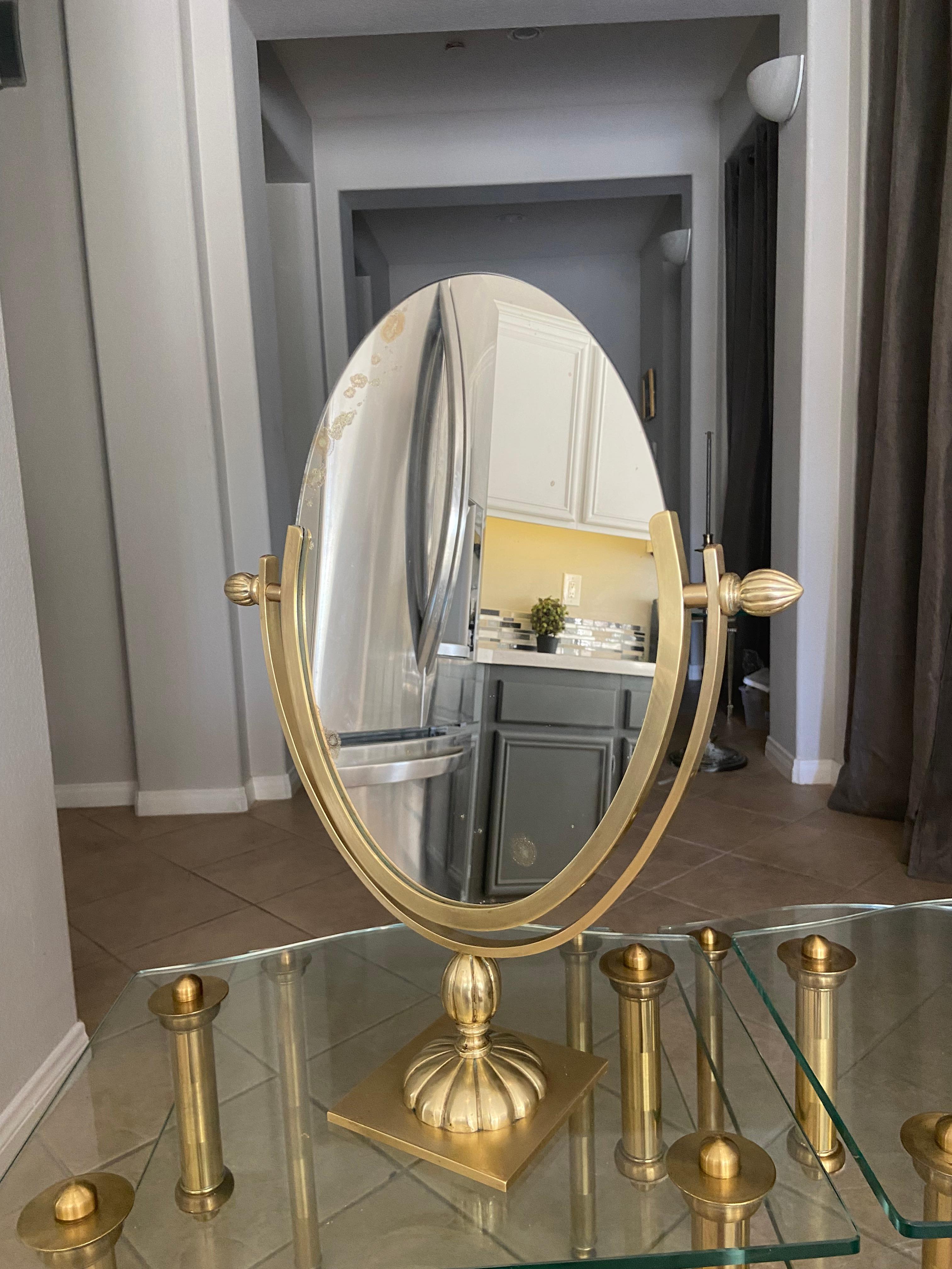 oval swivel mirror