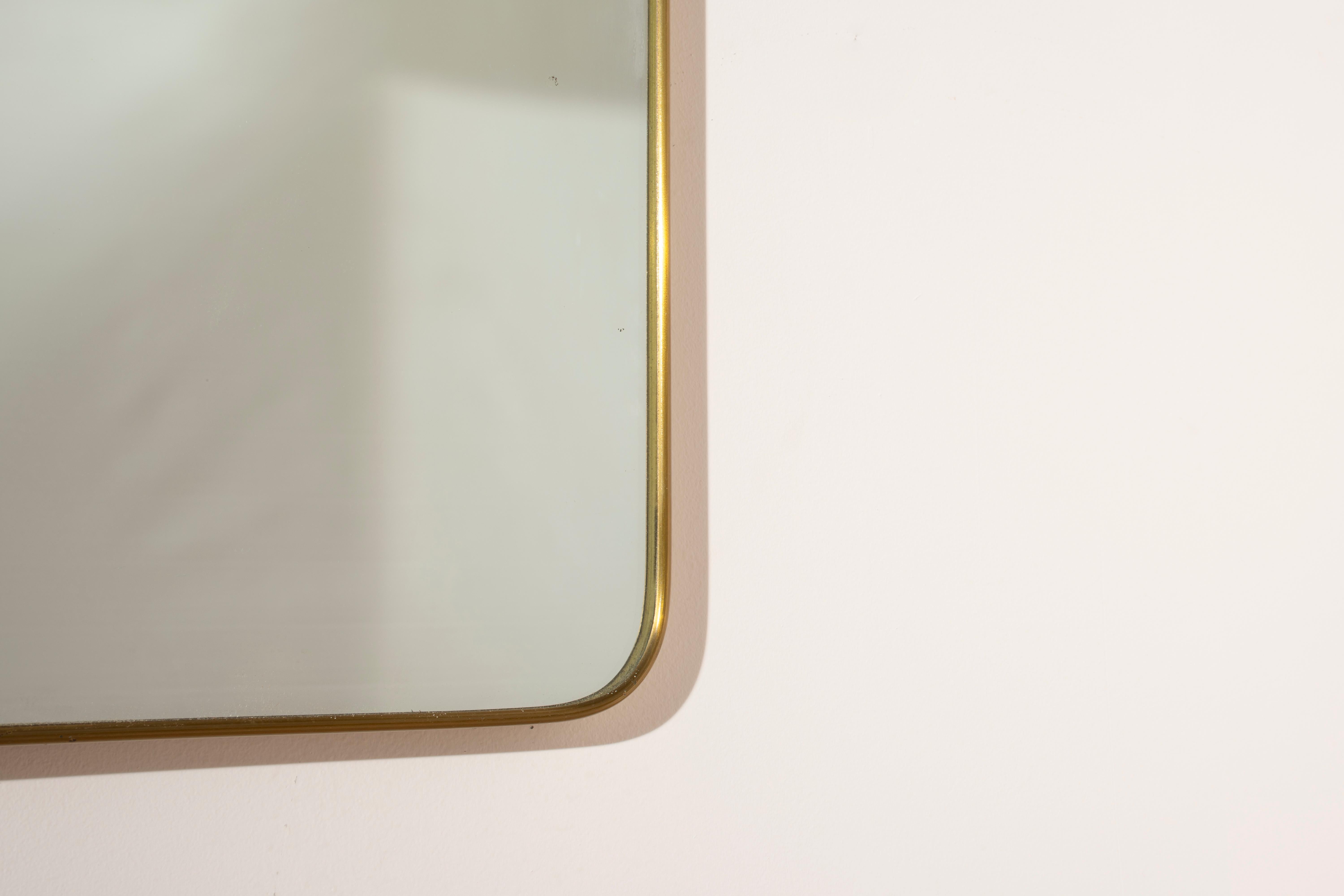 Mid-20th Century Large brass wall mirror with integrated lights, Italy, 1950s For Sale