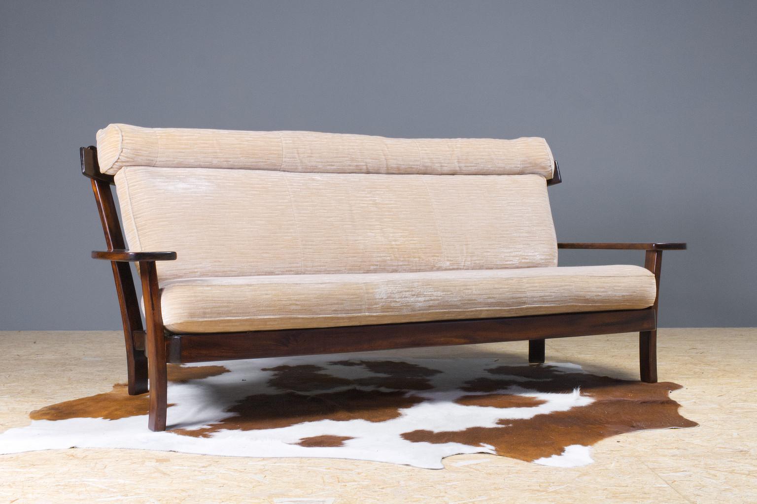 Large 3-seat sofa in solid rosewood with beige mohair velvet upholstery, 1960s. This piece has the Brazilian playfulness that is characteristic in designs by Percival Lafer or Sergio Rodrigues, yet designer, so far, unknown.

The beige mohair