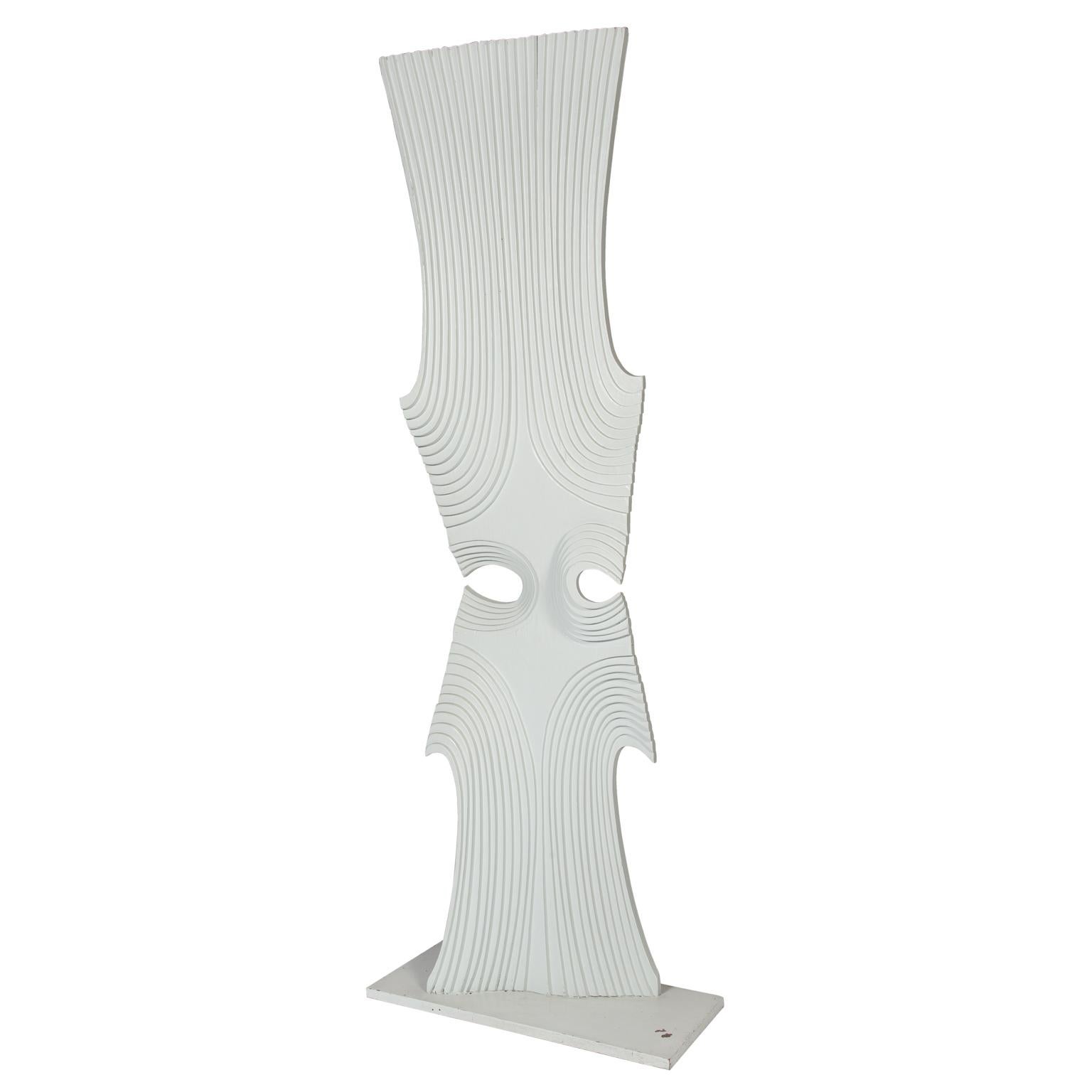 An impressive sized white painted contoured wood band saw sculpture mounted to a board base, attributed to the British sculptor Brian Wilshire.
