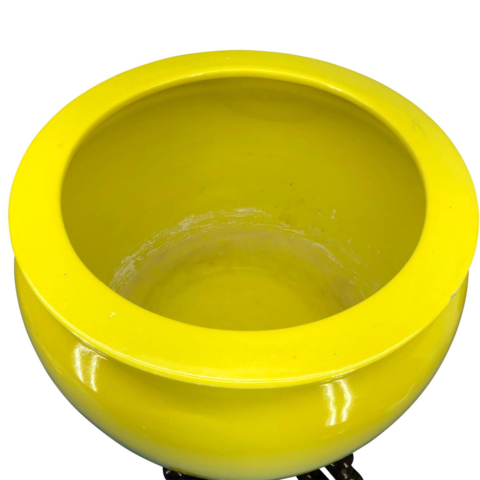 large yellow ceramic plant pot