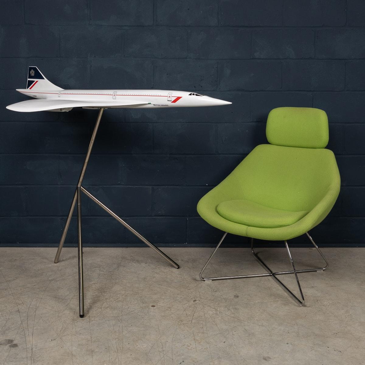 A splendid vintage fibreglass and plastic composite model of a Concorde in full British Airways livery mounted on a tripod stand by Space Models, circa 1990. This 1:36 scale aircraft model would have been presented to one of BA's top travel agents