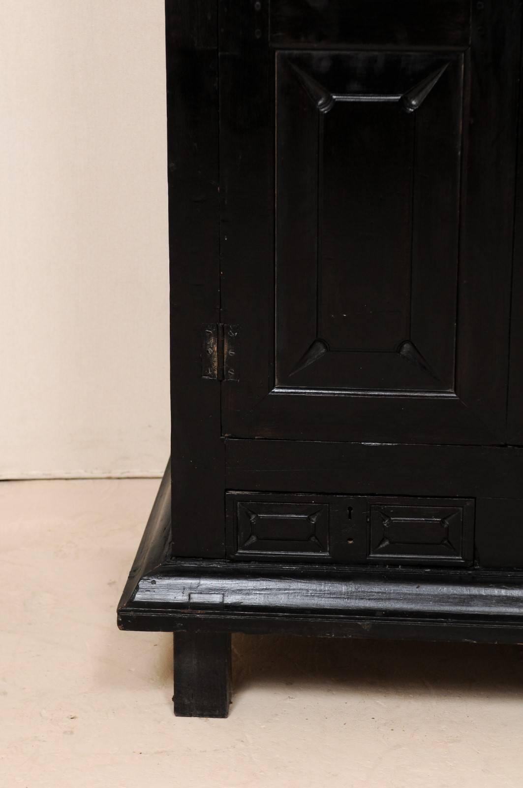 Carved British Colonial Ebonized Wood Cabinet w/Four Paneled Doors, 6 ft x 6.5 ft Tall 