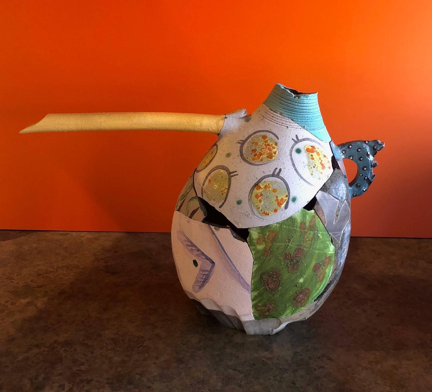A wonderful large broken clay raku pottery vase / vessel by Califorina artist, Patrick Crabb, circa 1990s. The pieces “deconstruction approach” (shards/fragmentation) is inspired by artist Rick Dillingham from the 1970s era and is influenced and