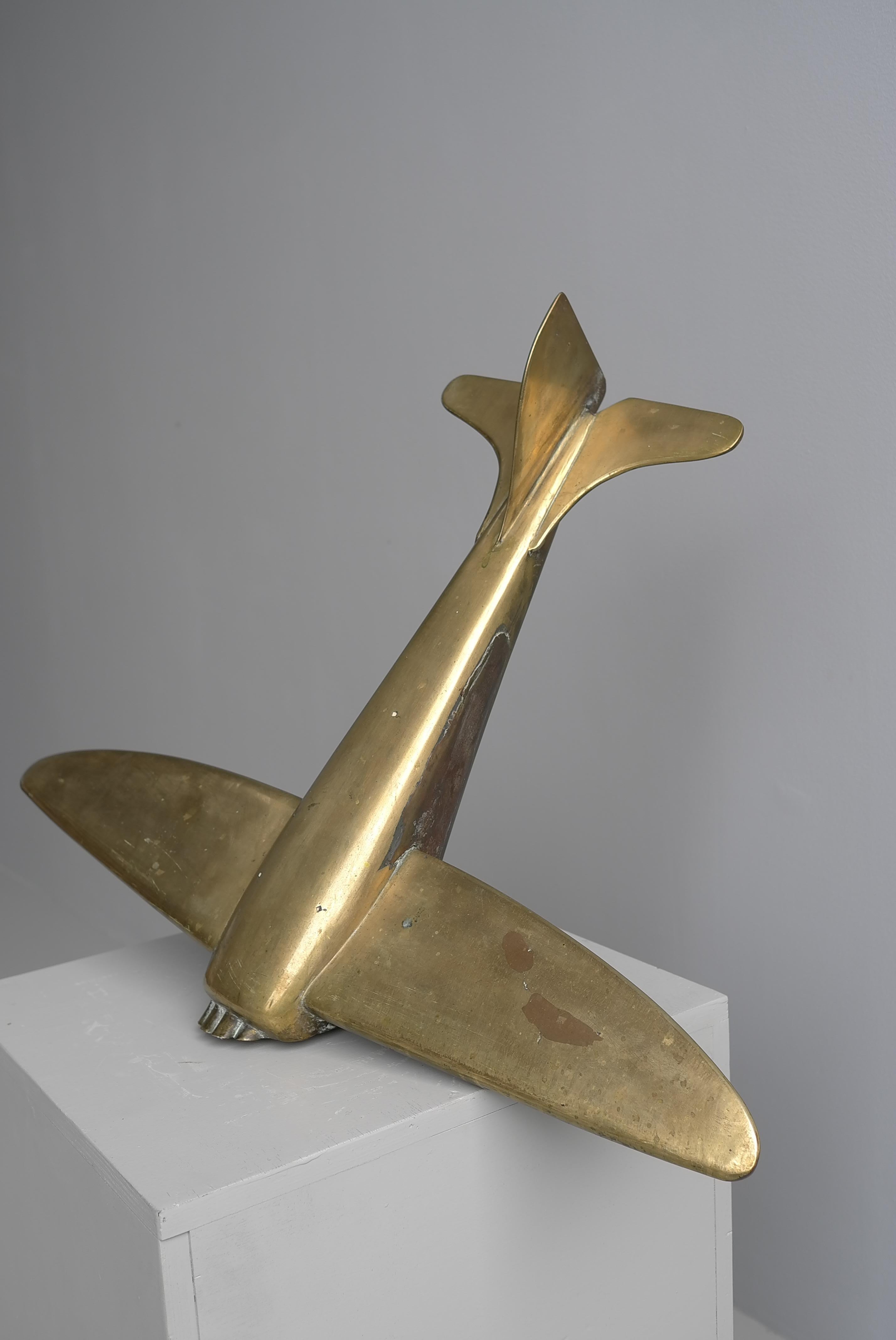 Large Bronze and Brass Airplane 'Crashed' Mancave Art Deco Mid Century Modern.

This is an eye-Catcher and suits any Mid-Century or modern home. Can be placed on the ground, sideboard etc. In good vintage condition with a lovely Patina.