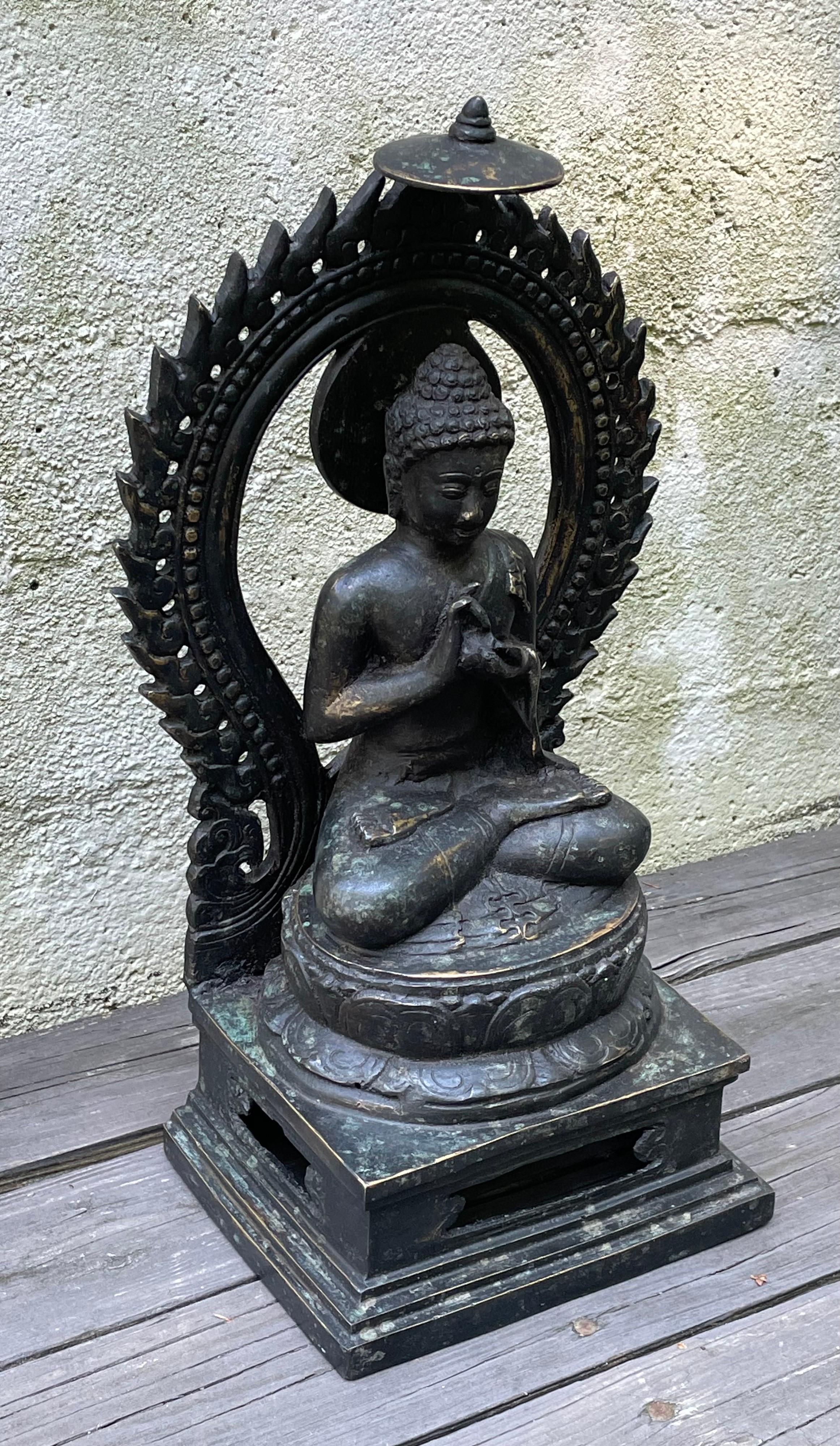 Beautiful dark bronze Buddha statue seated in lotus position, early 20th century, Tibet.