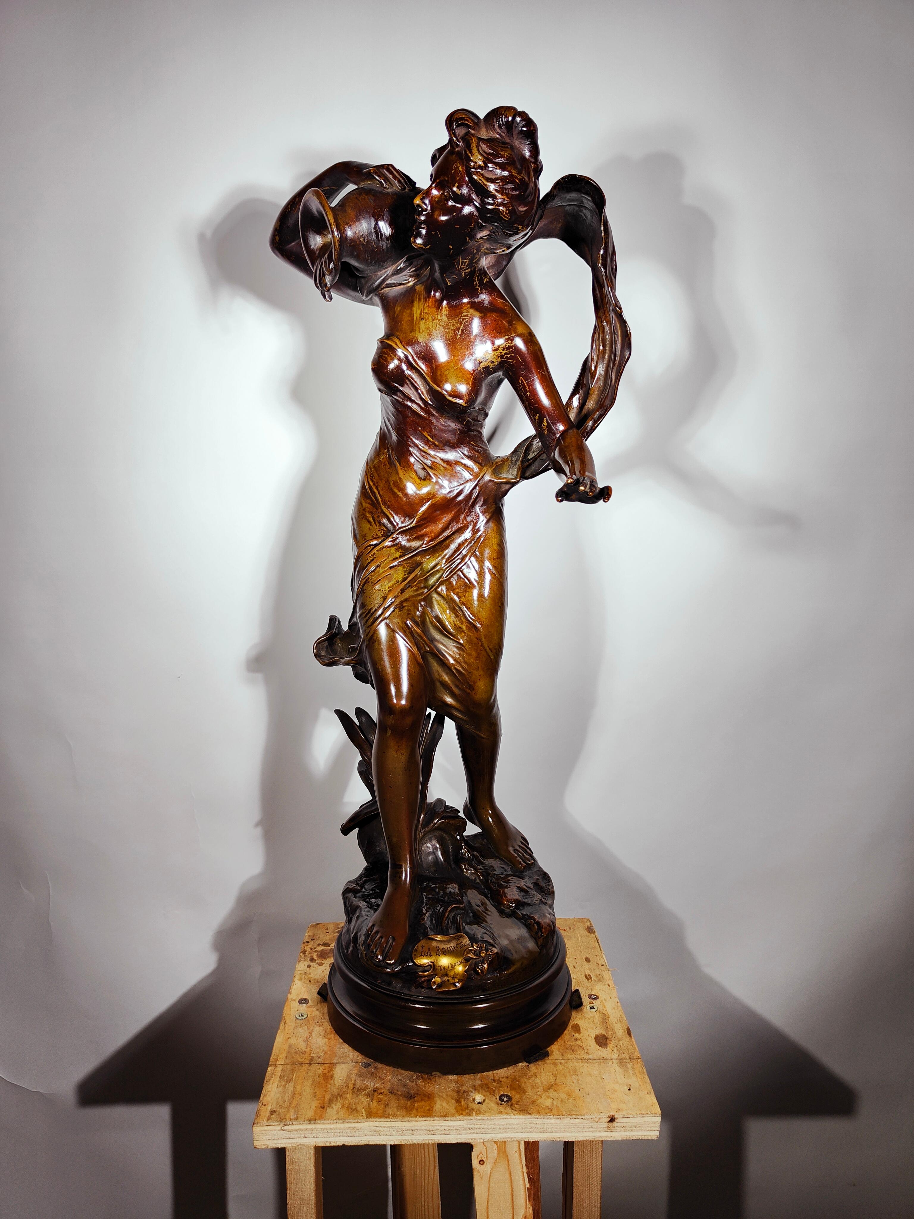 Large bronze by: Charles Théodore Perron (French 1862-1934)
Elegant 19th century bronze signed CH Perron. It has a base that allows the sculpture to rotate 380 degrees. This work is called -LA SOURCE-- and represents a young woman with a water