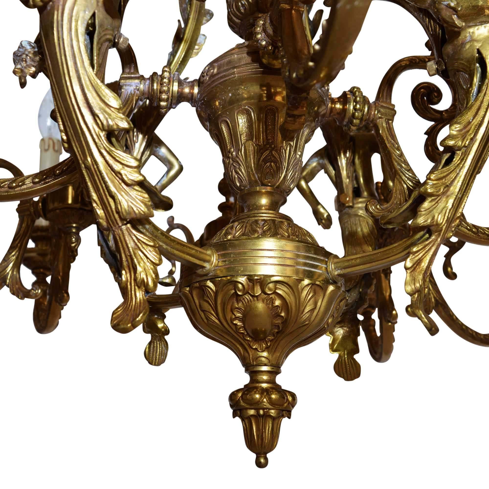 Italian Large Bronze Chandelier Adorned with Cherubs For Sale