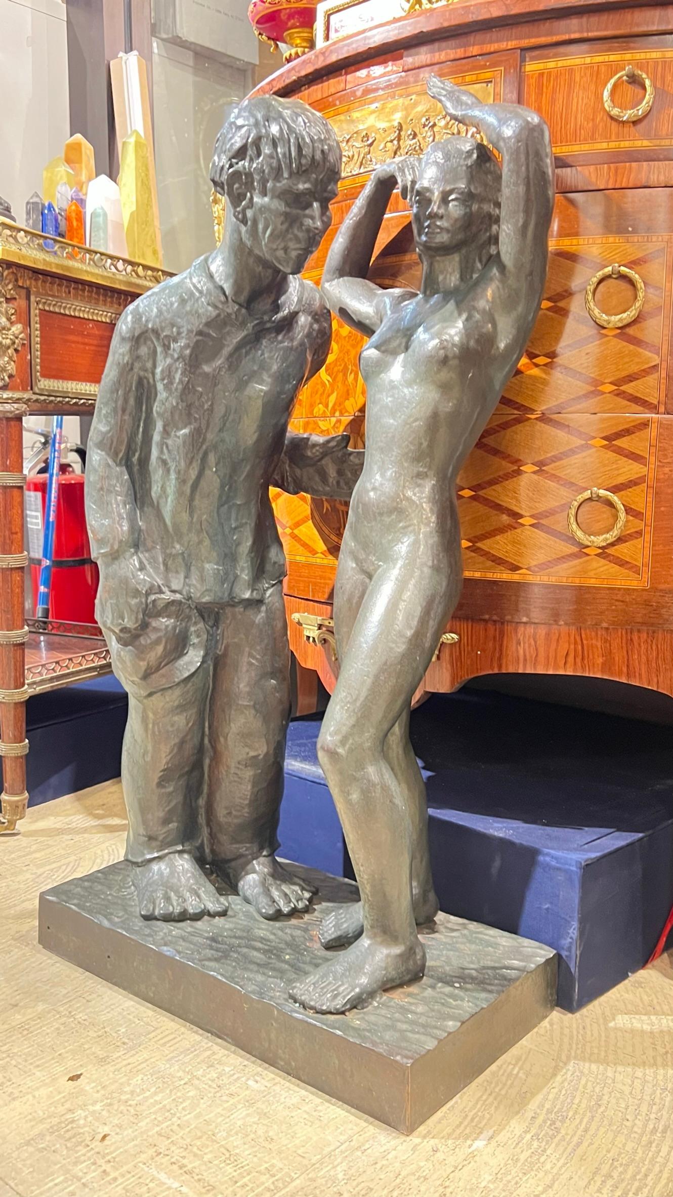 Mid-century modern period figurative bronze sculpture by the Belgian artist, Firmin Vandewoude (1907-1994), depicting standing male beside nude female.