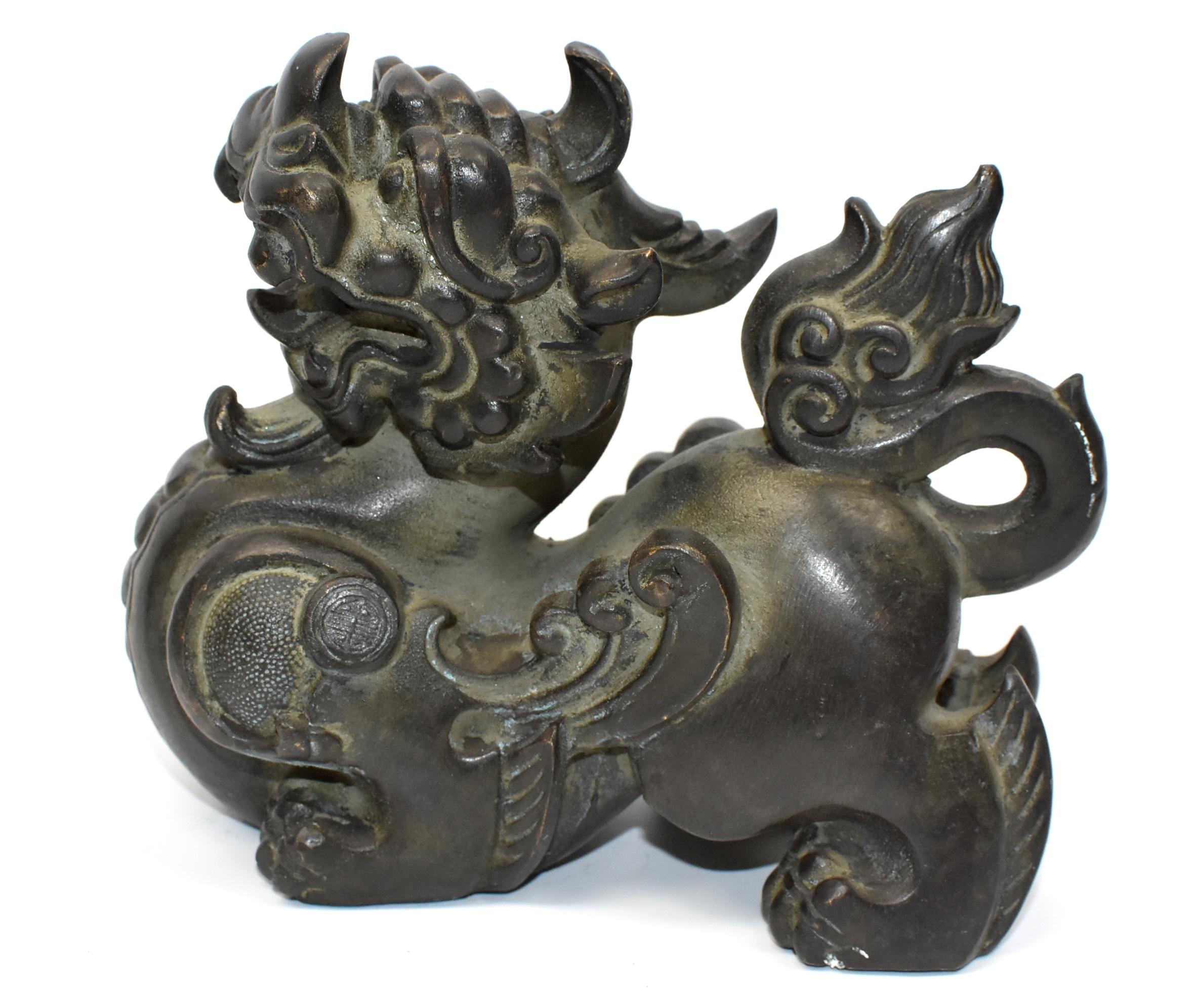 A beautiful bronze Pixiu winged Foo Dog lions. These are mythical beasts believed to bring and keep wealth. Fine craftsmanship and vivid expressions. Detailed works throughout. They are fantastic sculptures and make great doorstops and