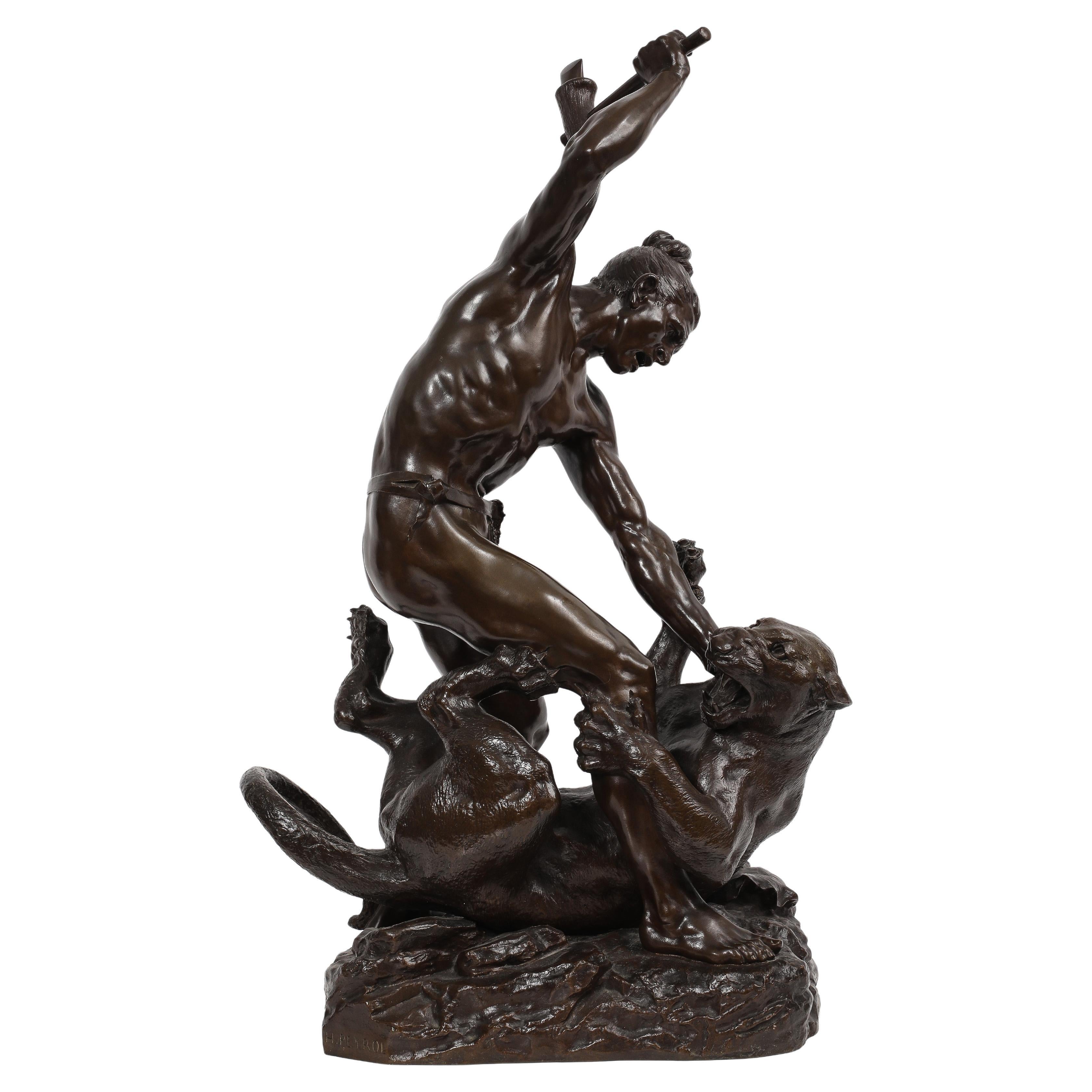 Large Bronze Group of a Man Fighting a Lion/Lioness, Signed “H. Peyrol” For Sale