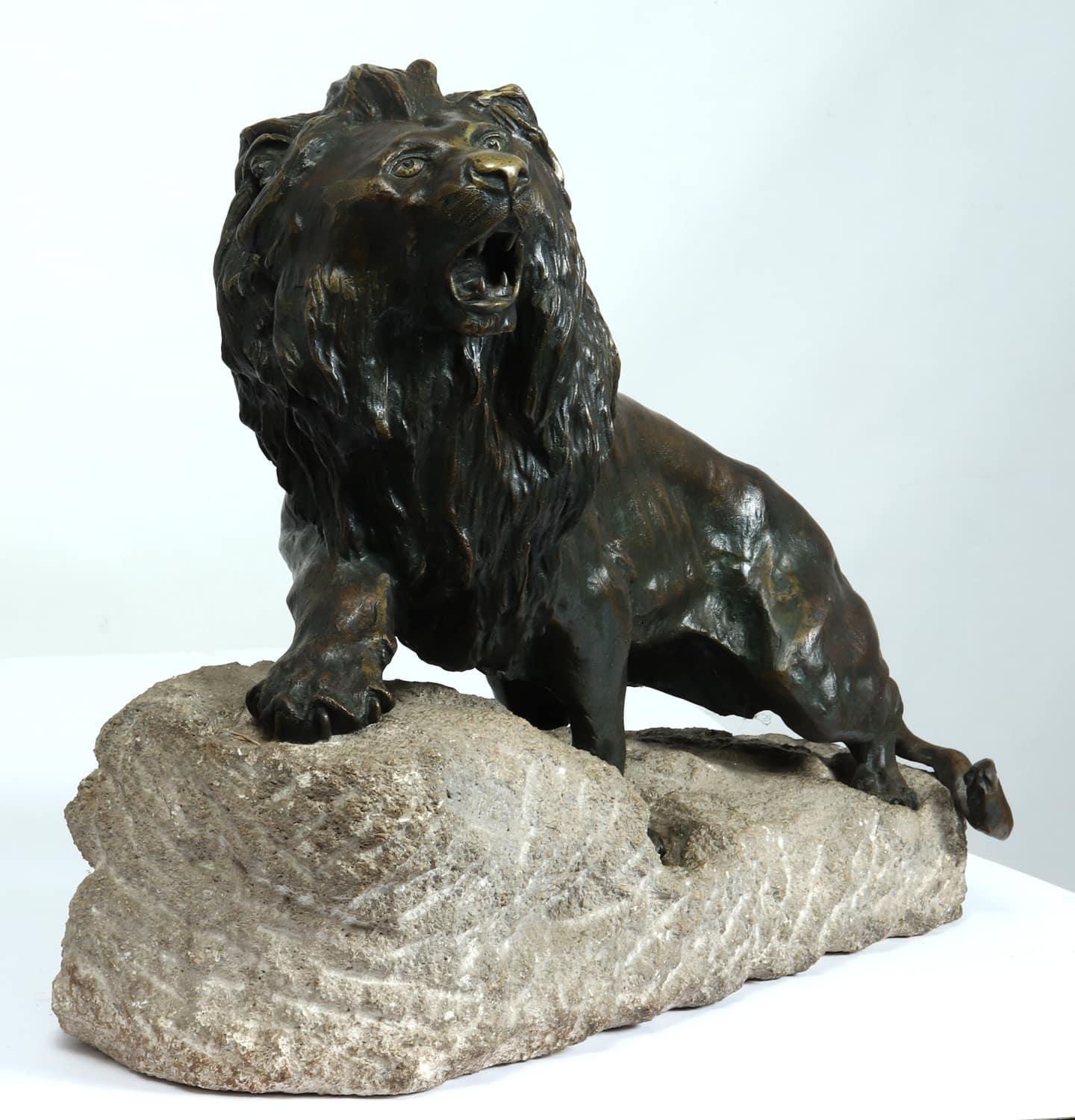 French Large Bronze Lion on a Rock by Cartier, c1920