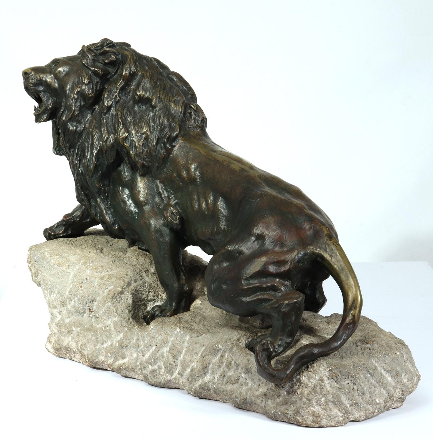 Early 20th Century Large Bronze Lion on a Rock by Cartier, c1920