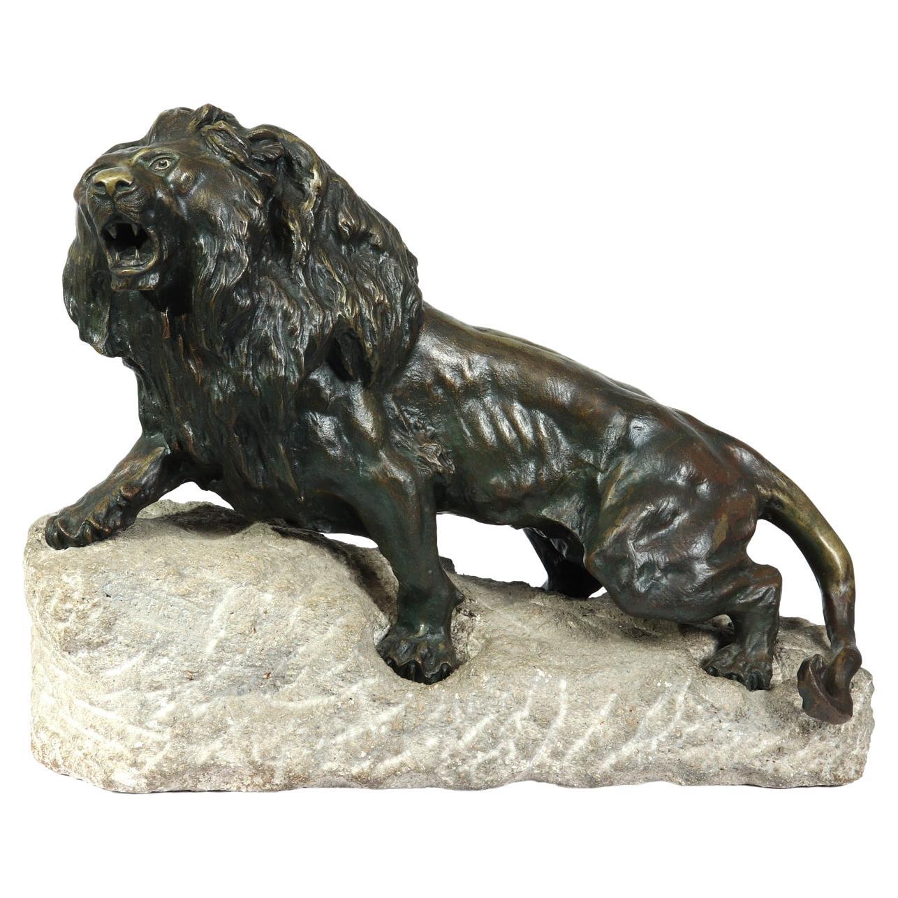Large Bronze Lion on a Rock by Cartier, c1920