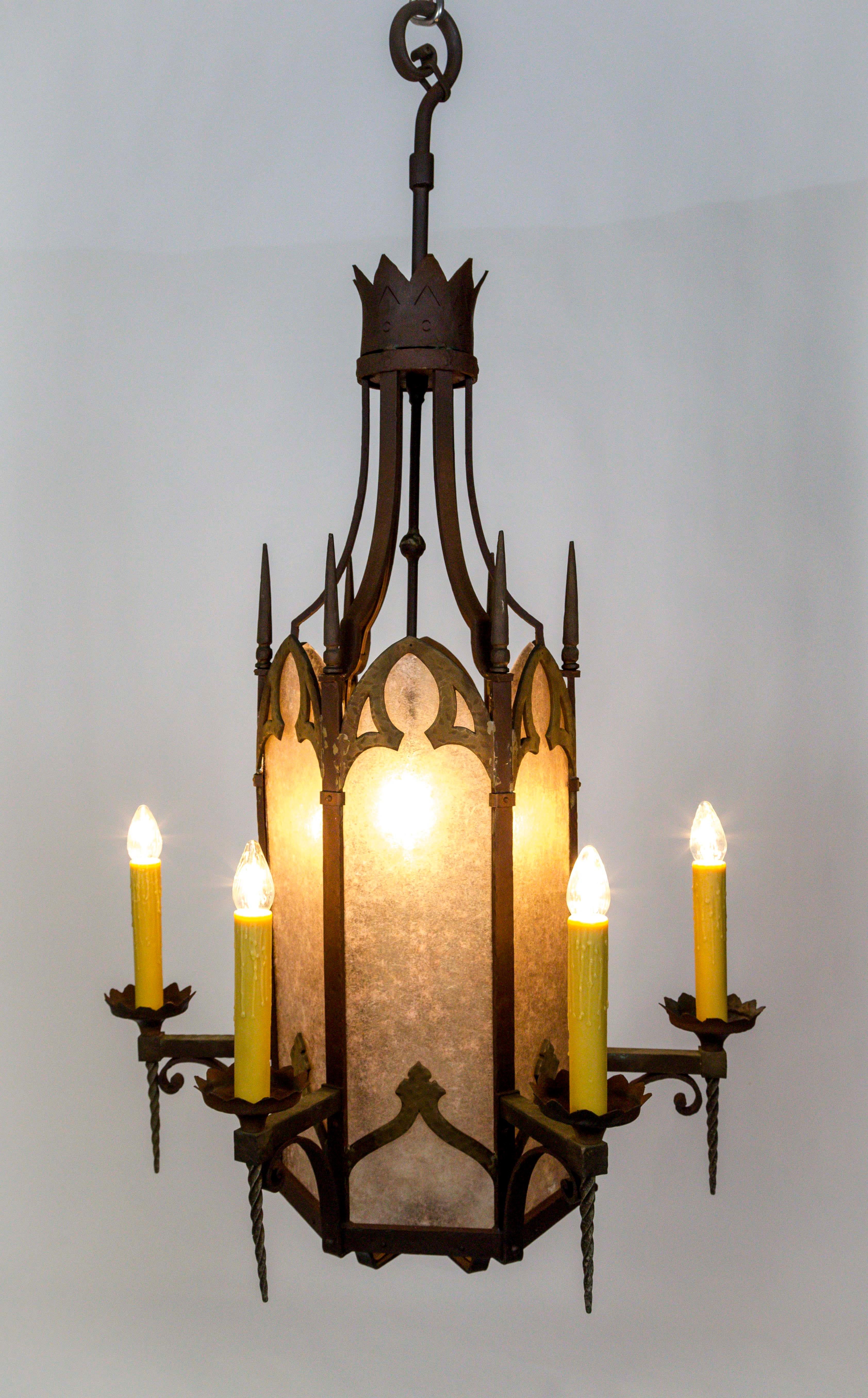 A pair of remarkable Renaissance Revival style lanterns made for a church in Oakland, California, circa 1910, shown here with and without the mica. They are hexagonal prism shaped, made of bronze and steel, with new mica 