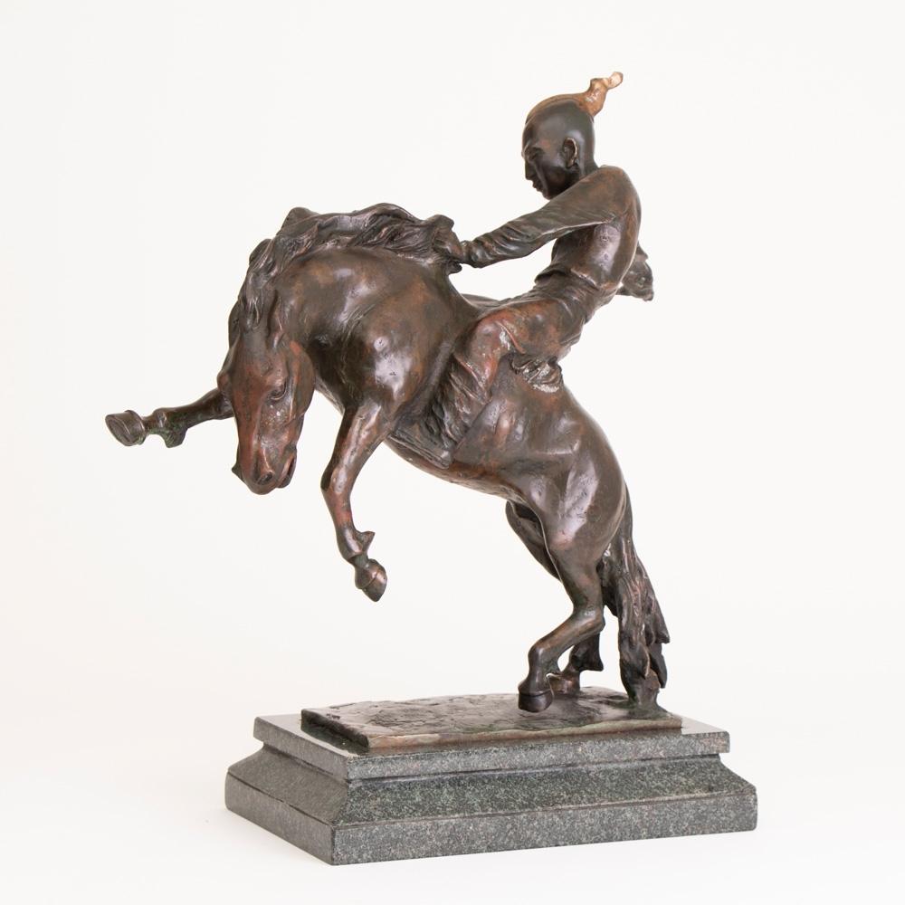 Large bronze statue of a Mongolian horseman mounted on marble base, foundry stamped and signed. This is a very rare Bronze.

We have added photos of the stamp. We are still researching the origins of the stamp.
   