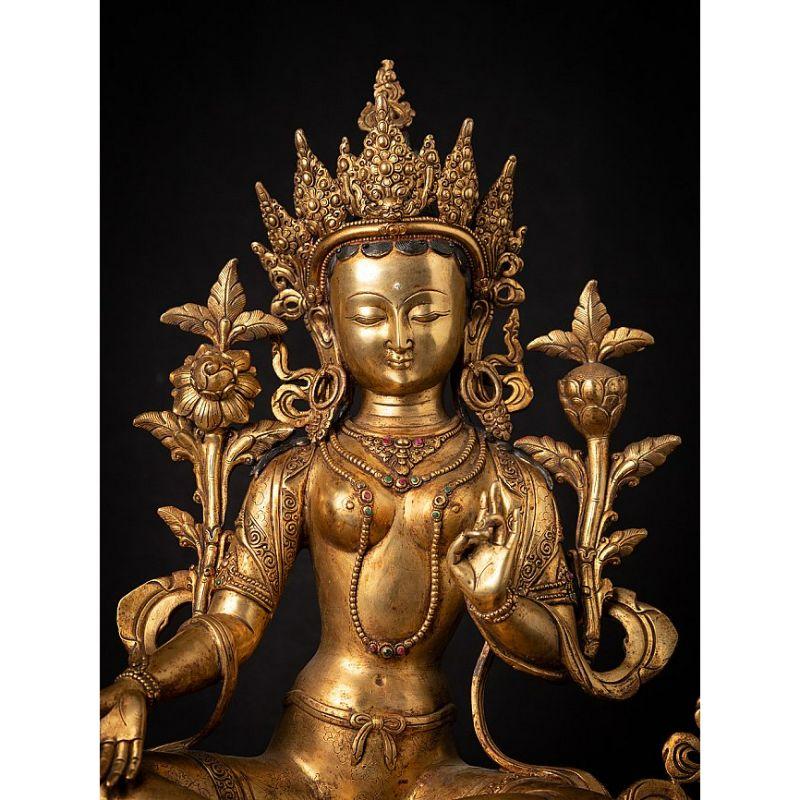 Material: bronze
47,7 cm high 
36 cm wide and 26 cm deep
Weight: 9.65 kgs
Fire gilded with 24 krt. gold
Originating from Nepal
Late 20th century
Very high quality !

