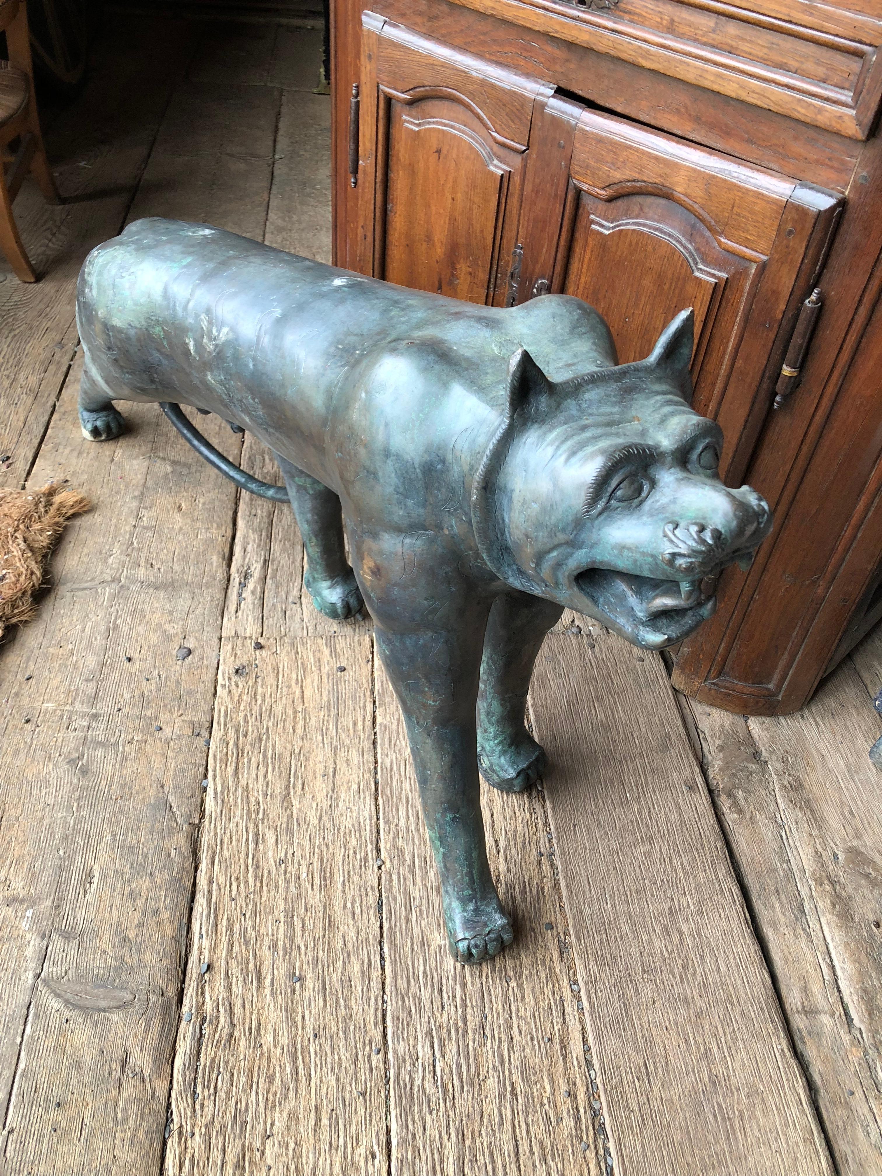 A large patinated bronze statue of a jungle cat by designer Phyllis Morris.

 