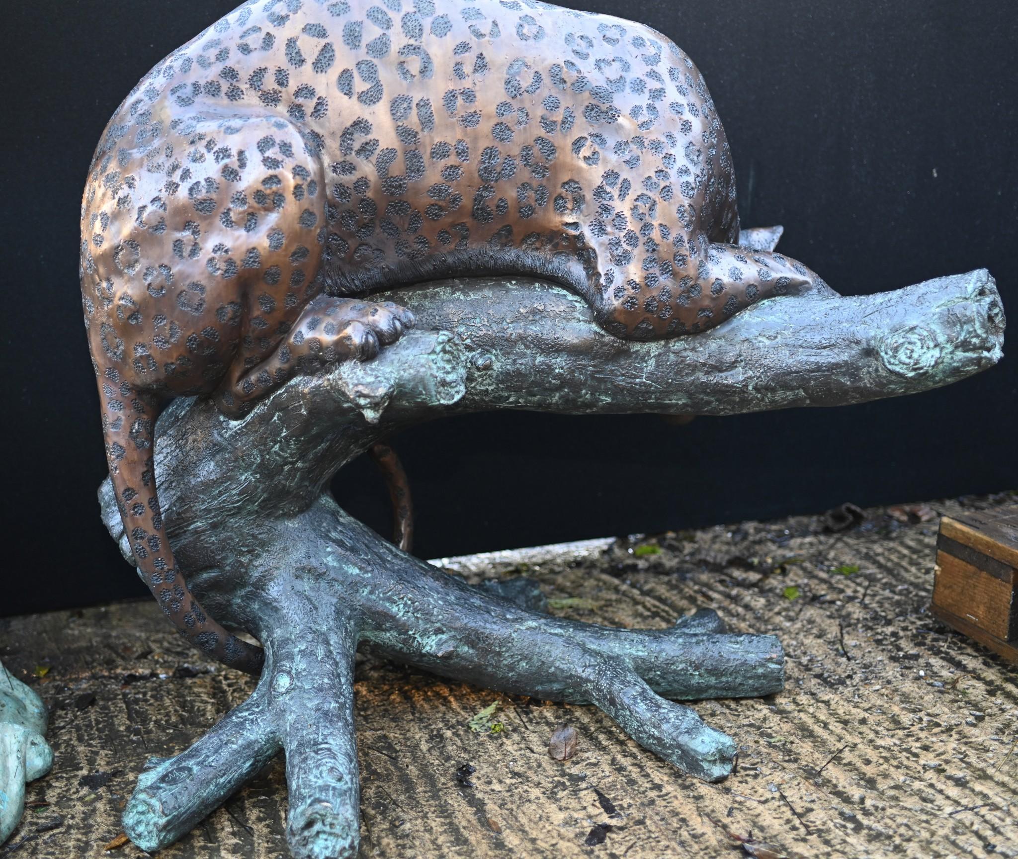 Eye catching large bronze casting of a panther 
Cat depicted on the prowl on the tree trunk
Good size at over three feet tall - 96 cm
Of course being bronze this can live outside with no fear of rusting
Patina to the bronze is superb and the
