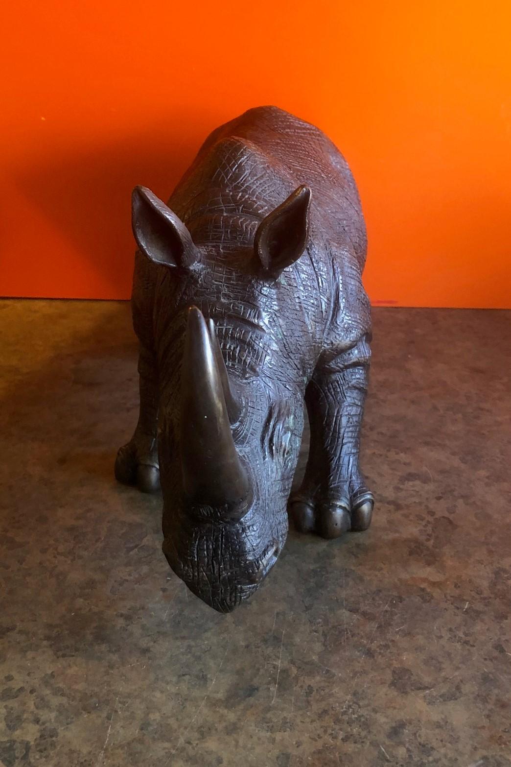 bronze rhinoceros sculpture