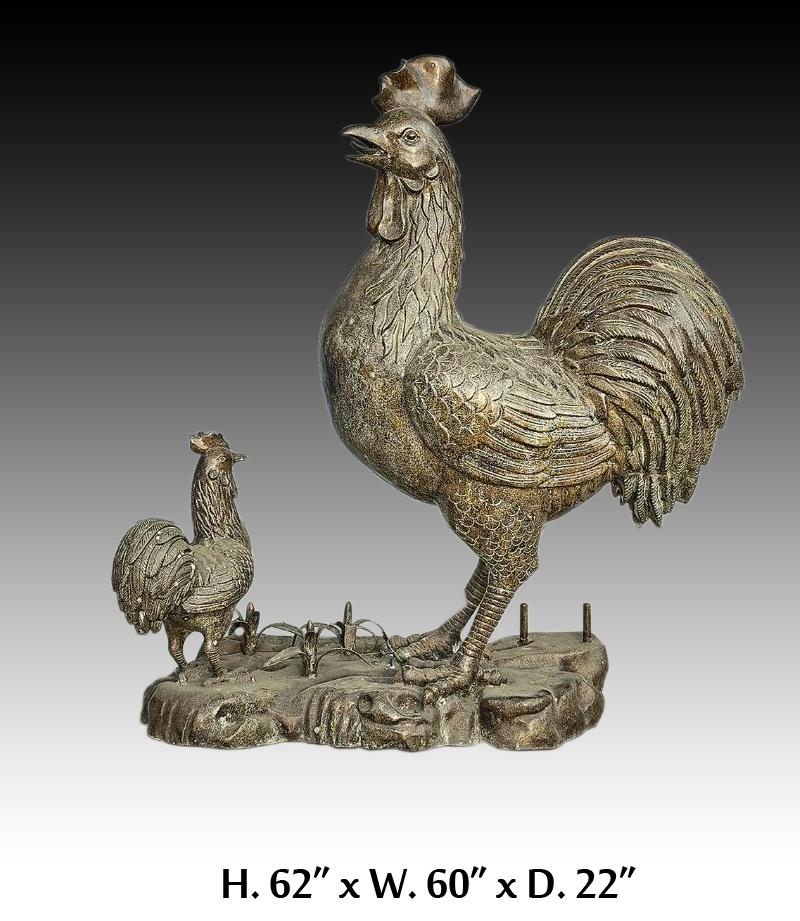 Impressive large bronze rooster group, consisting of a large rooster with smaller rooster, among cornstalks. 
for indoor or outdoor
Measures; H.62