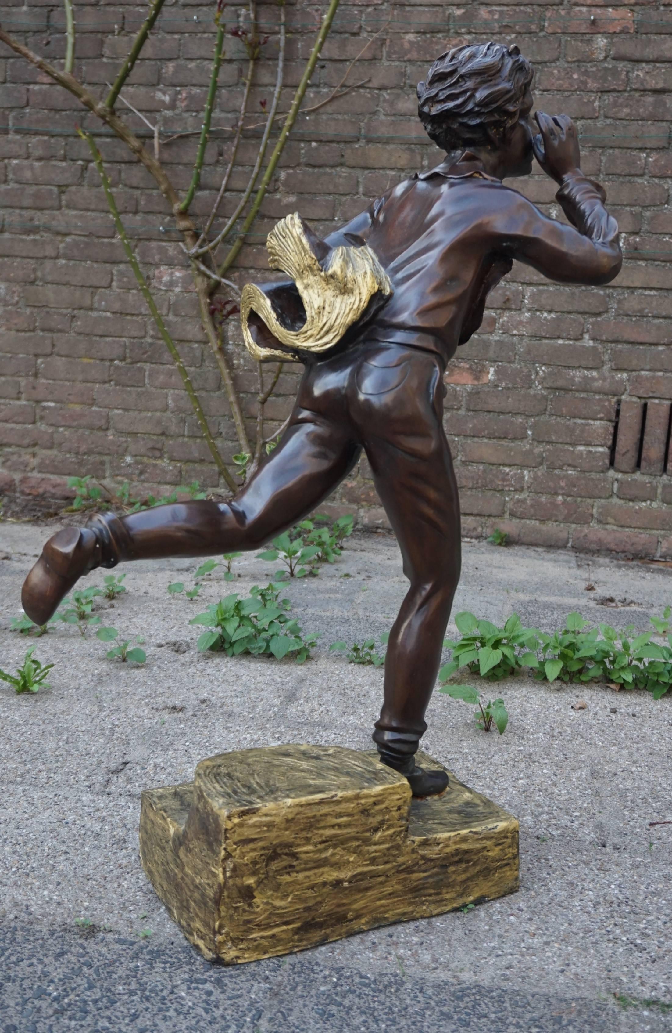 bronze boy on milk churn statue
