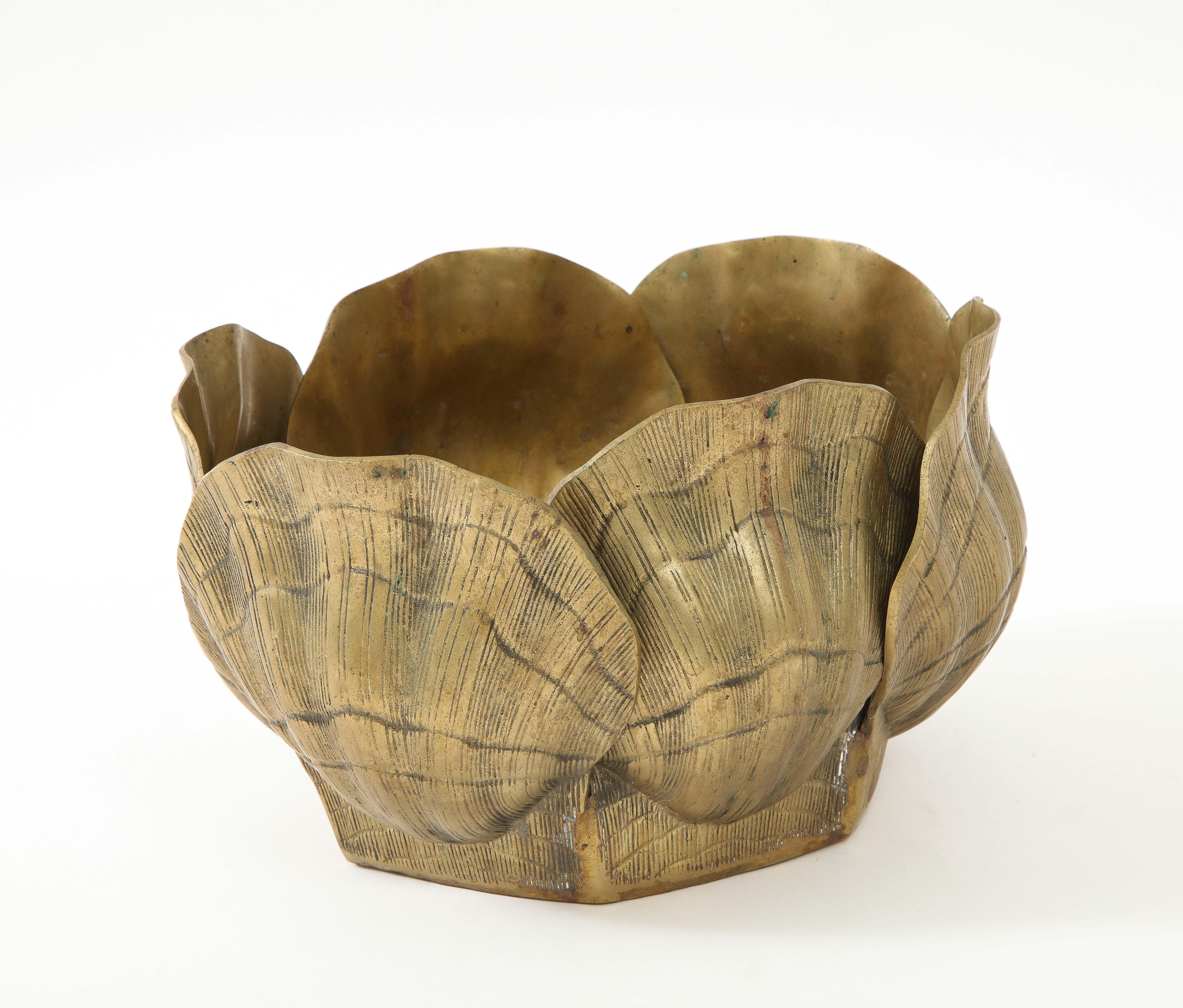 Mid Century large fanciful planter/cach pot featuring 6 stylized shells in heavy bronze.