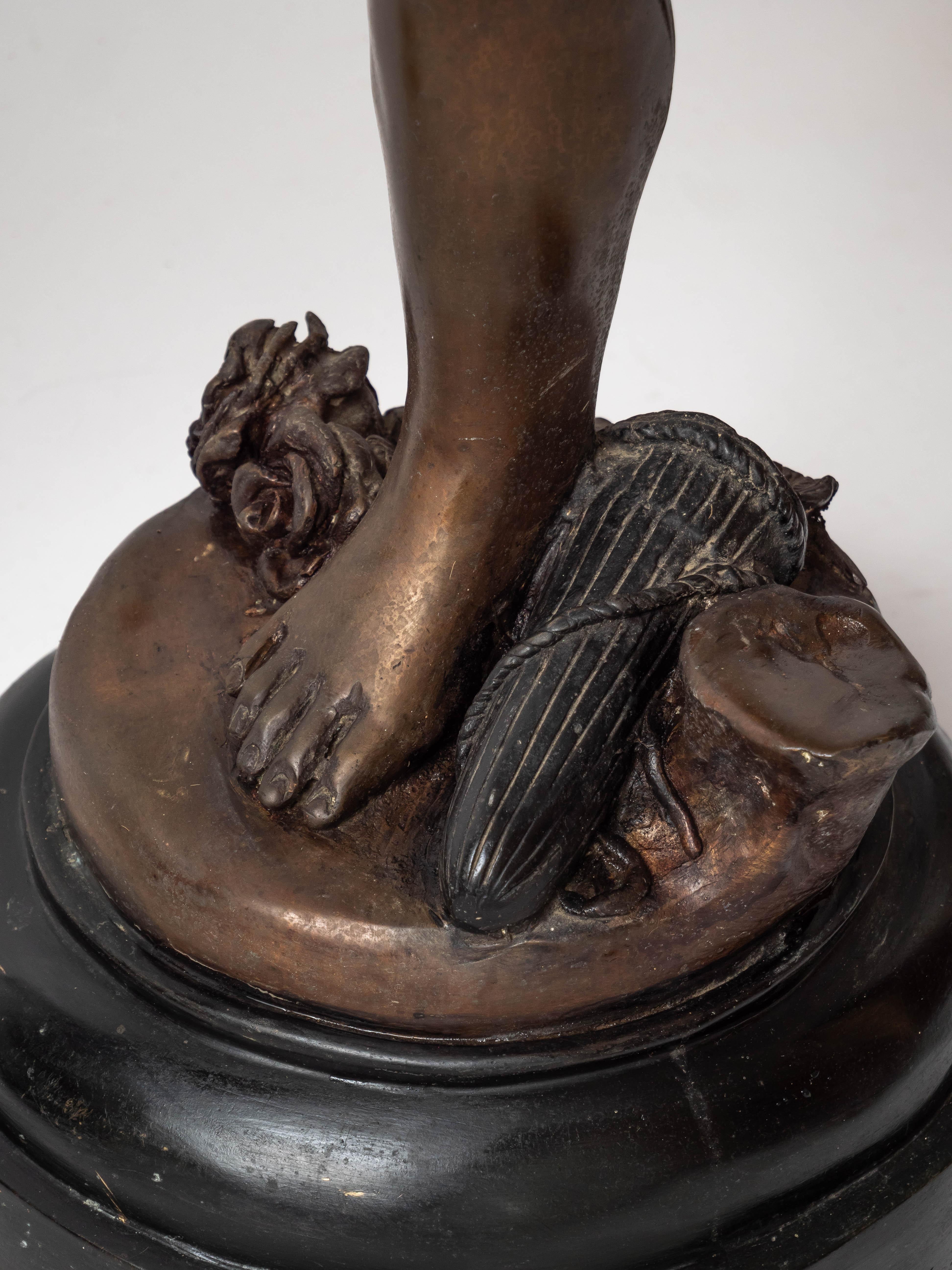 Large bronze statues of Cupids carrying a torch For Sale 5