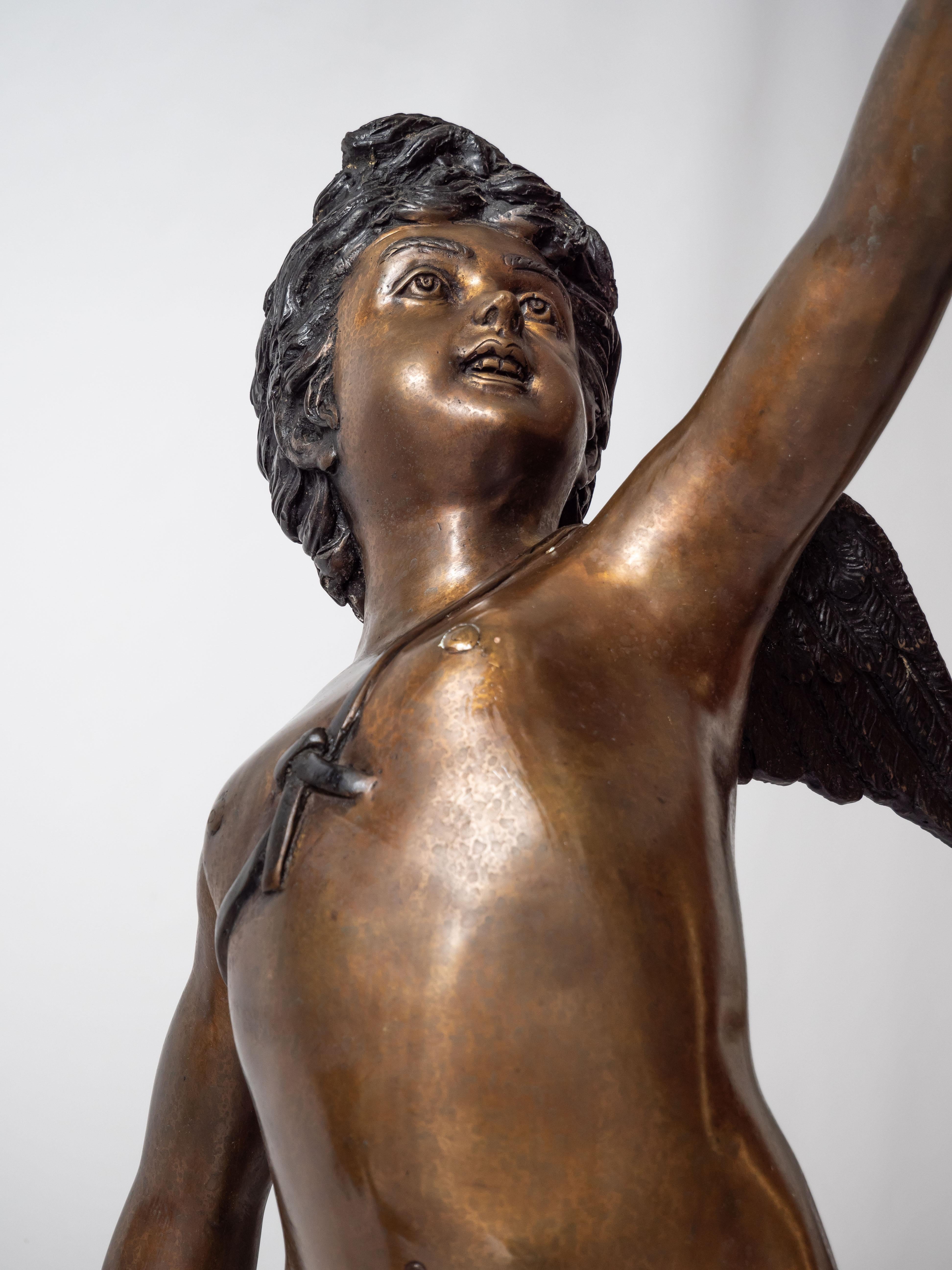 Large bronze statues of Cupids carrying a torch For Sale 8