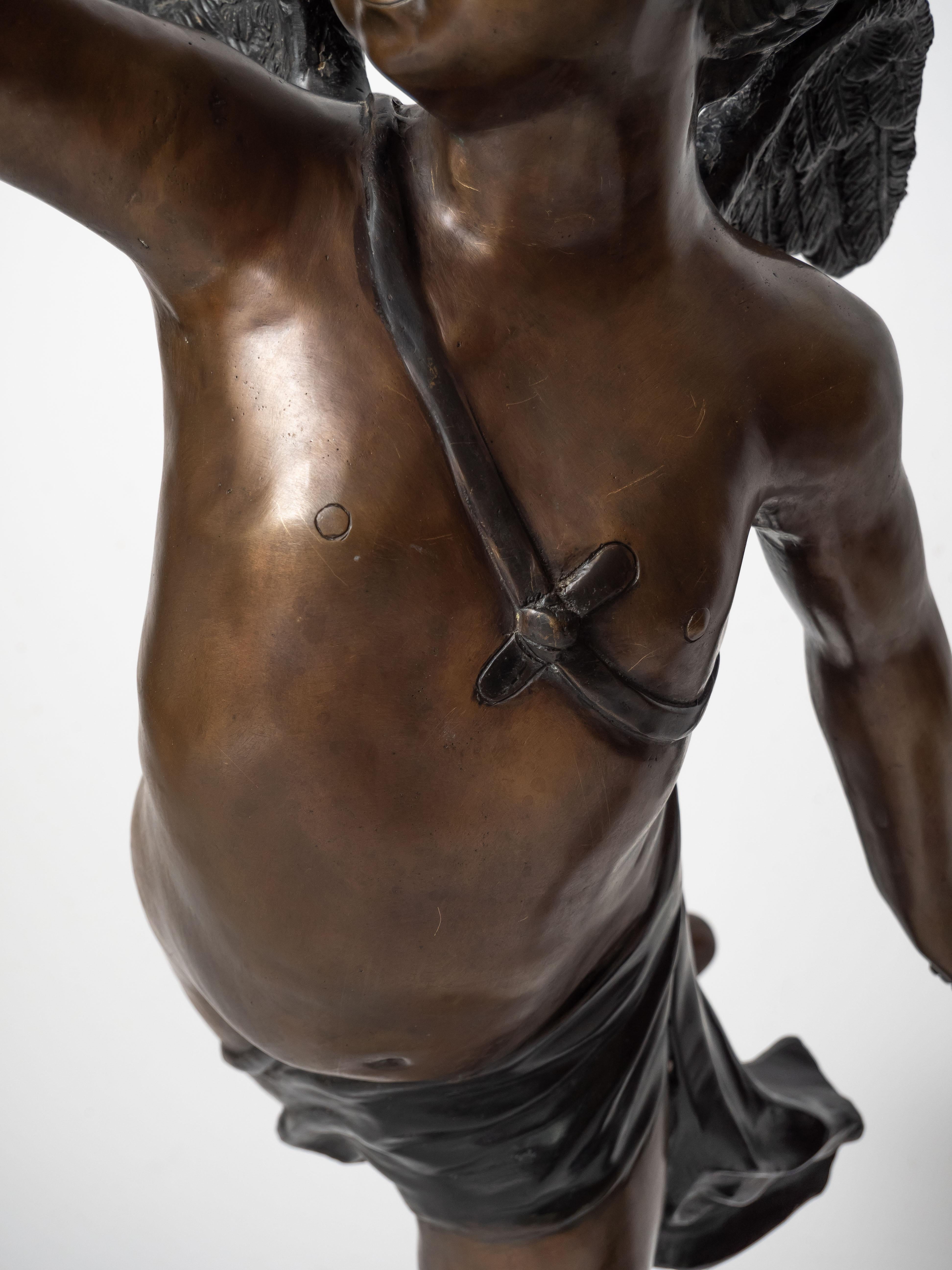 Bronze Large bronze statues of Cupids carrying a torch For Sale