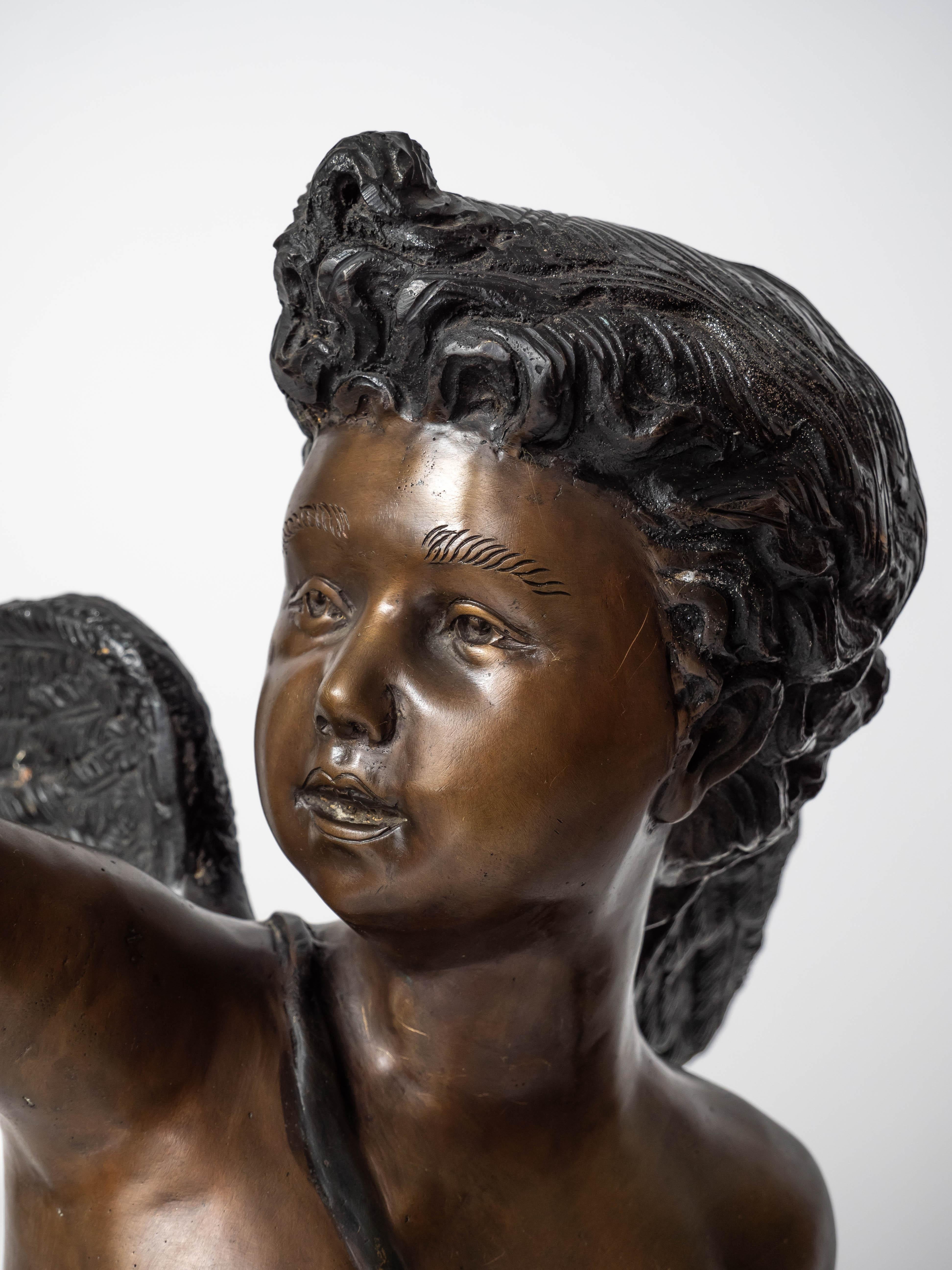 Large bronze statues of Cupids carrying a torch For Sale 1