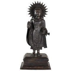 Large Bronze Tibetan Standing Buddha Sculpture with Halo Patinated