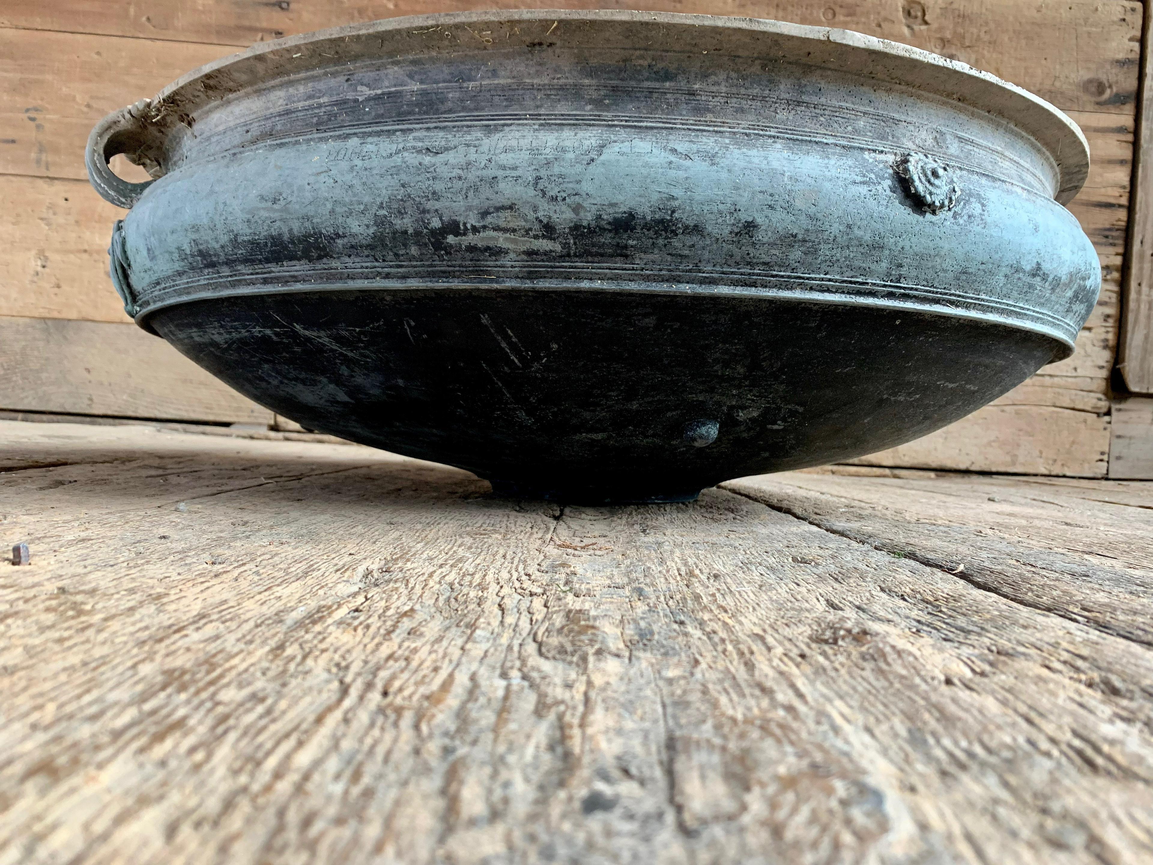 A 19th century large and heavy cast bronze bowl-form Urli with handles and a nice patina. Measures: 32