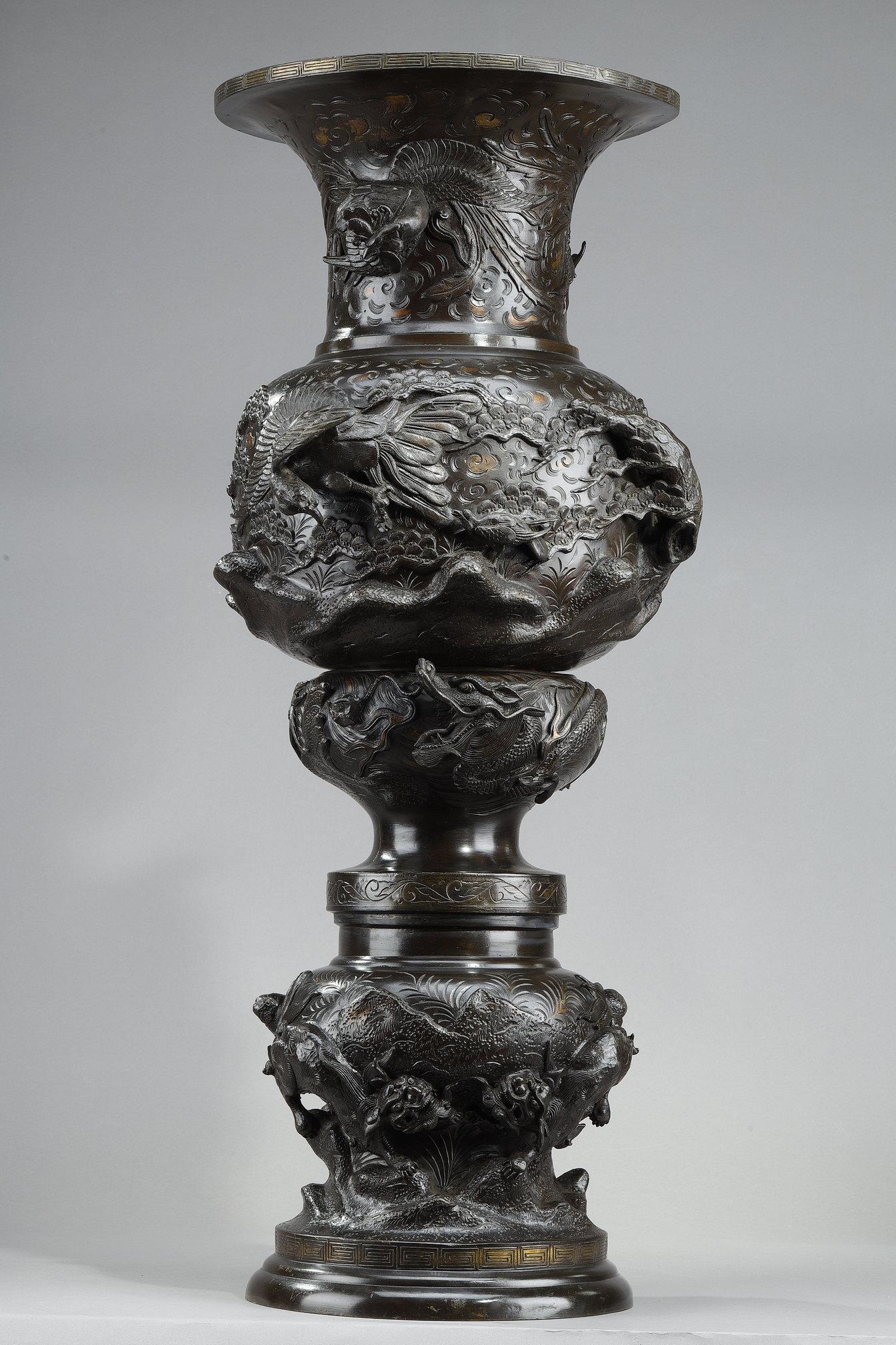 Japanese Large Bronze Vase sculpted with chimeras, dragons, birds of frey and phoenix For Sale