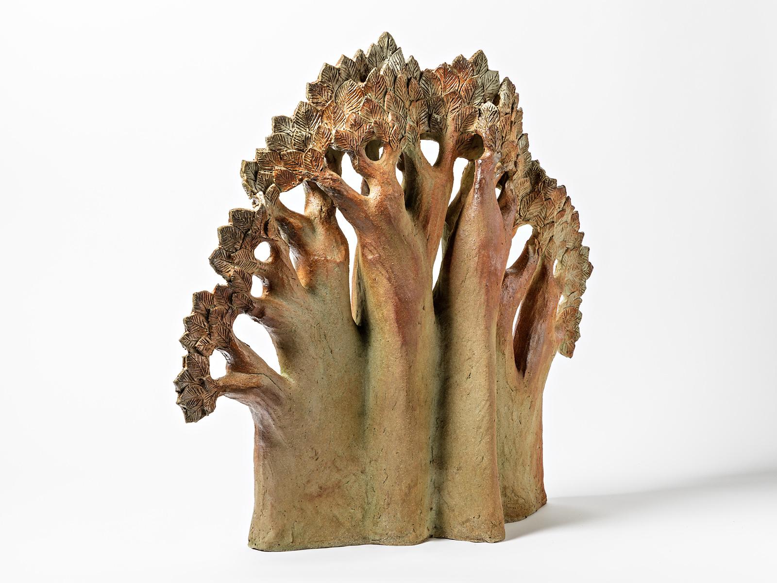 Claude Gaget 

Amazing large stoneware tree sculpture by the French artist.

Original perfect conditions, signed at the base GAGET

Brown and colored firing ceramic colors.

Measures: Height 69cm, large 70cm, depth 15cm.
