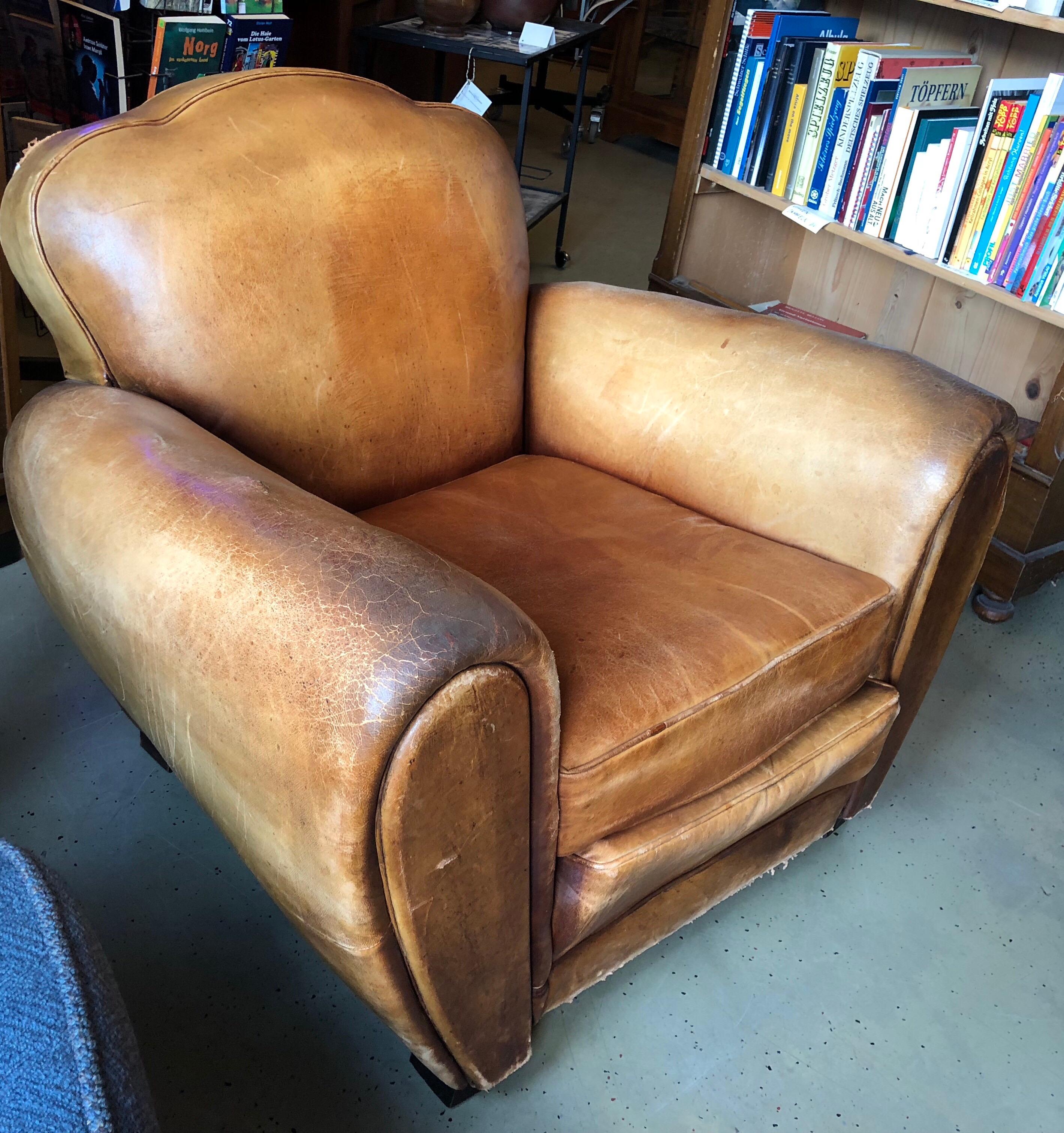 Large brown cognac club armchair original used leather in good condition as shown on the photos.

 


 